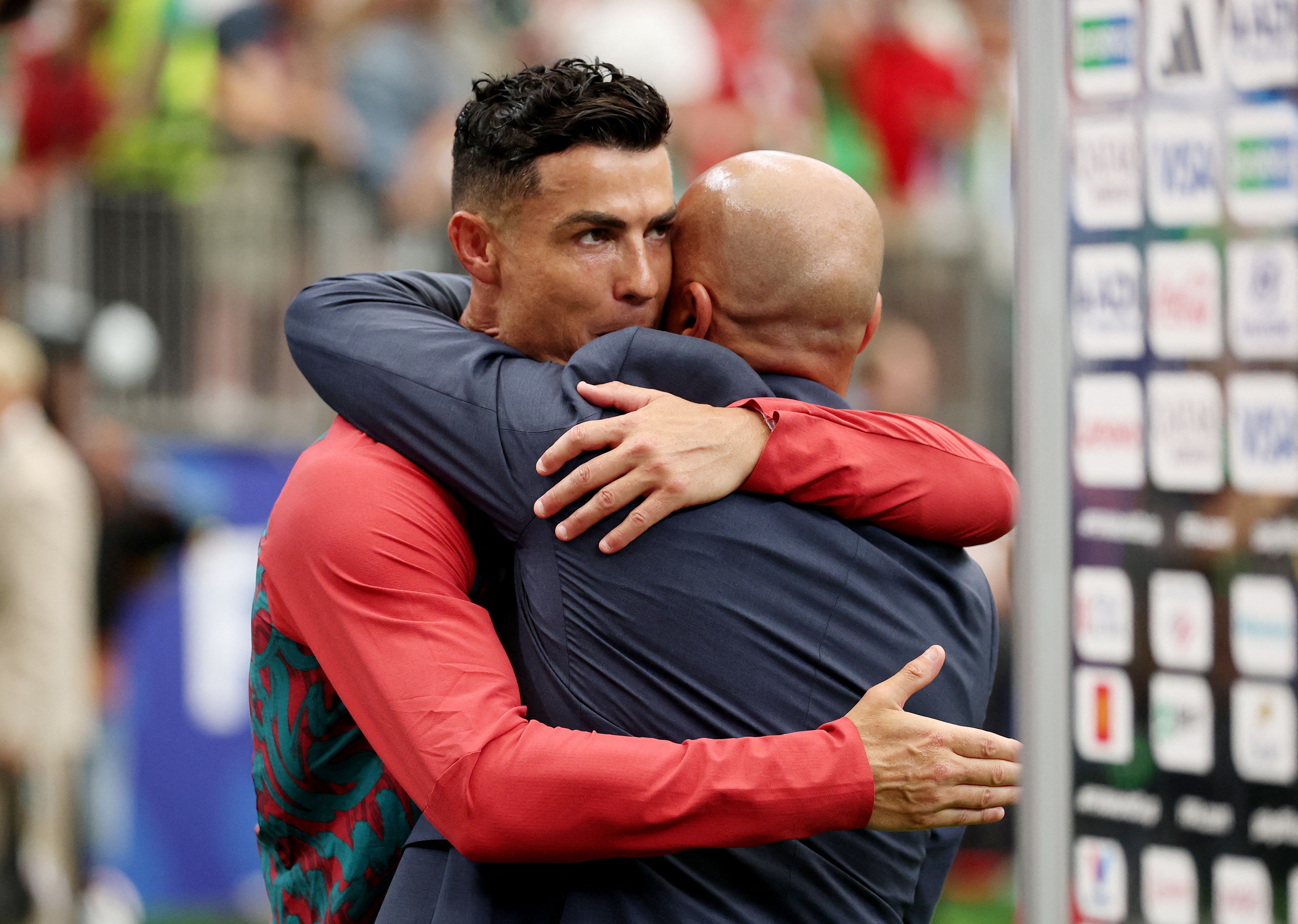 Soccer Football - FIFA World Cup 2026 - Group K - Portugal v Uzbekistan - Houston Stadium, Houston, Texas, U.S. - June 23, 2026 Portugal's Cristiano Ronaldo and coach Roberto Martinez celebrate after the match REUTERS/Phil Noble