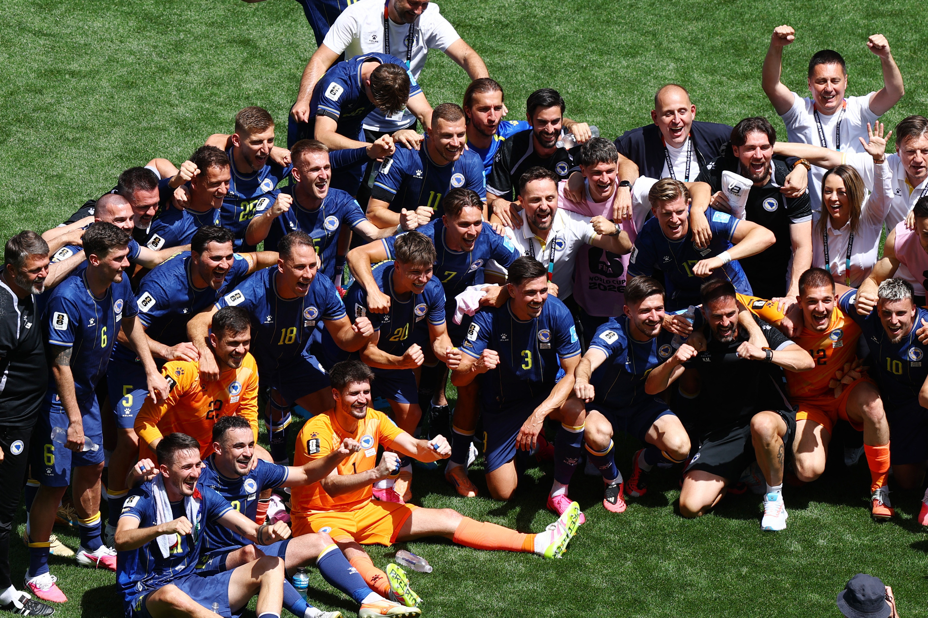 Soccer Football - FIFA World Cup 2026 - Group B - Bosnia and Herzegovina v Qatar - Seattle Stadium, Seattle, Washington, U.S. - June 24, 2026 Bosnia and Herzegovina players pose for a team group photo as they celebrate at the end of the match REUTERS/Eloi