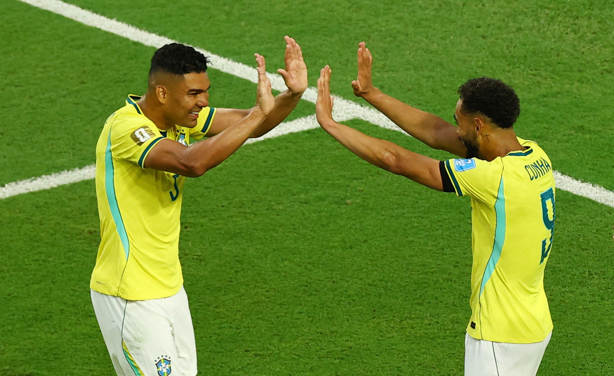 Soccer Football - FIFA World Cup 2026 - Group C - Scotland v Brazil - Miami Stadium, Miami Gardens, Florida, U.S. - June 24, 2026 Brazil's Matheus Cunha celebrates scoring their third goal with Casemiro REUTERS/Marco Bello
