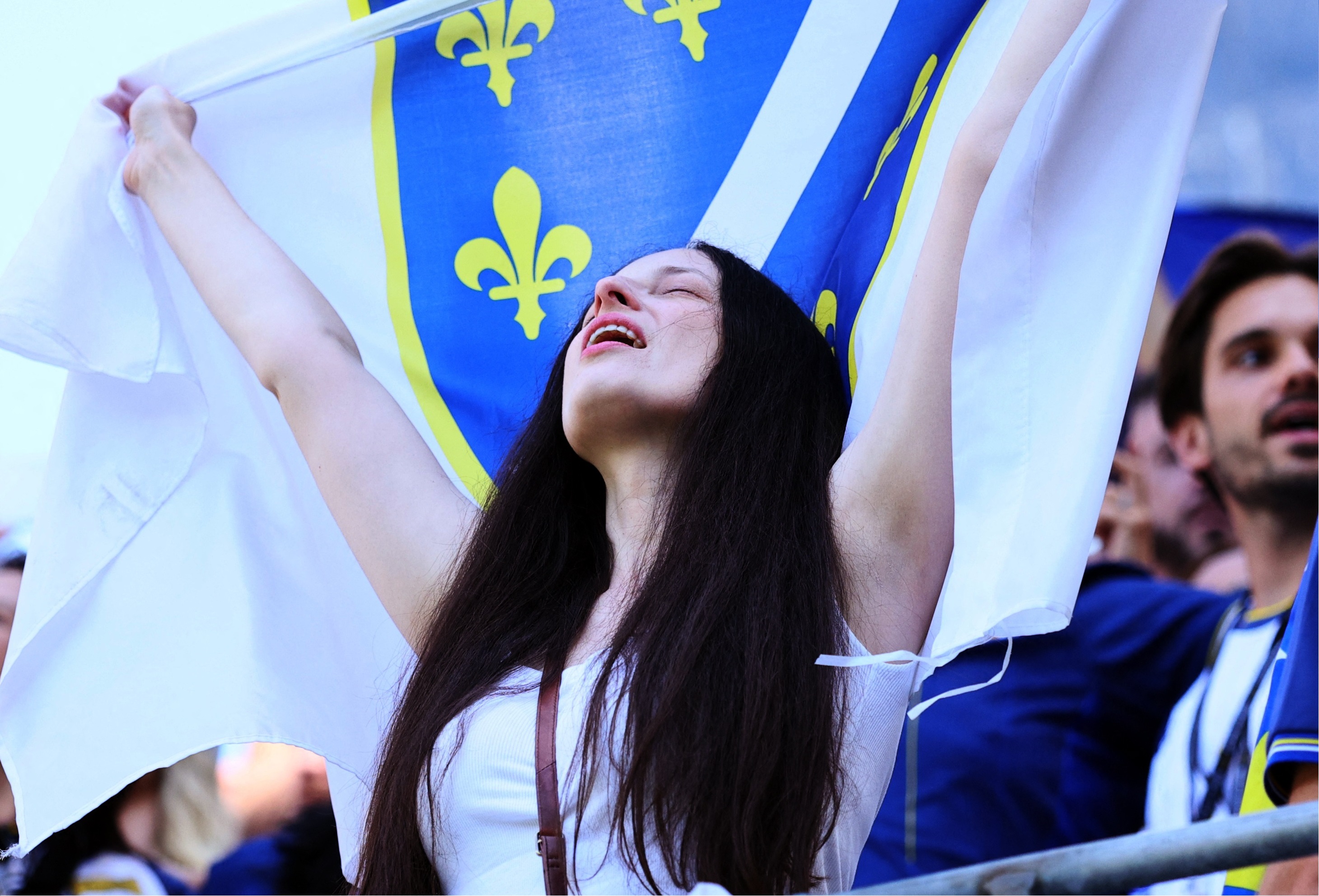 Soccer Football - FIFA World Cup 2026 - Group B - Bosnia and Herzegovina v Qatar - Seattle Stadium, Seattle, Washington, U.S. - June 24, 2026 Bosnia and Herzegovina fans with flags inside the stadium before the match IMAGN IMAGES via Reuters/Blake Dahlin
