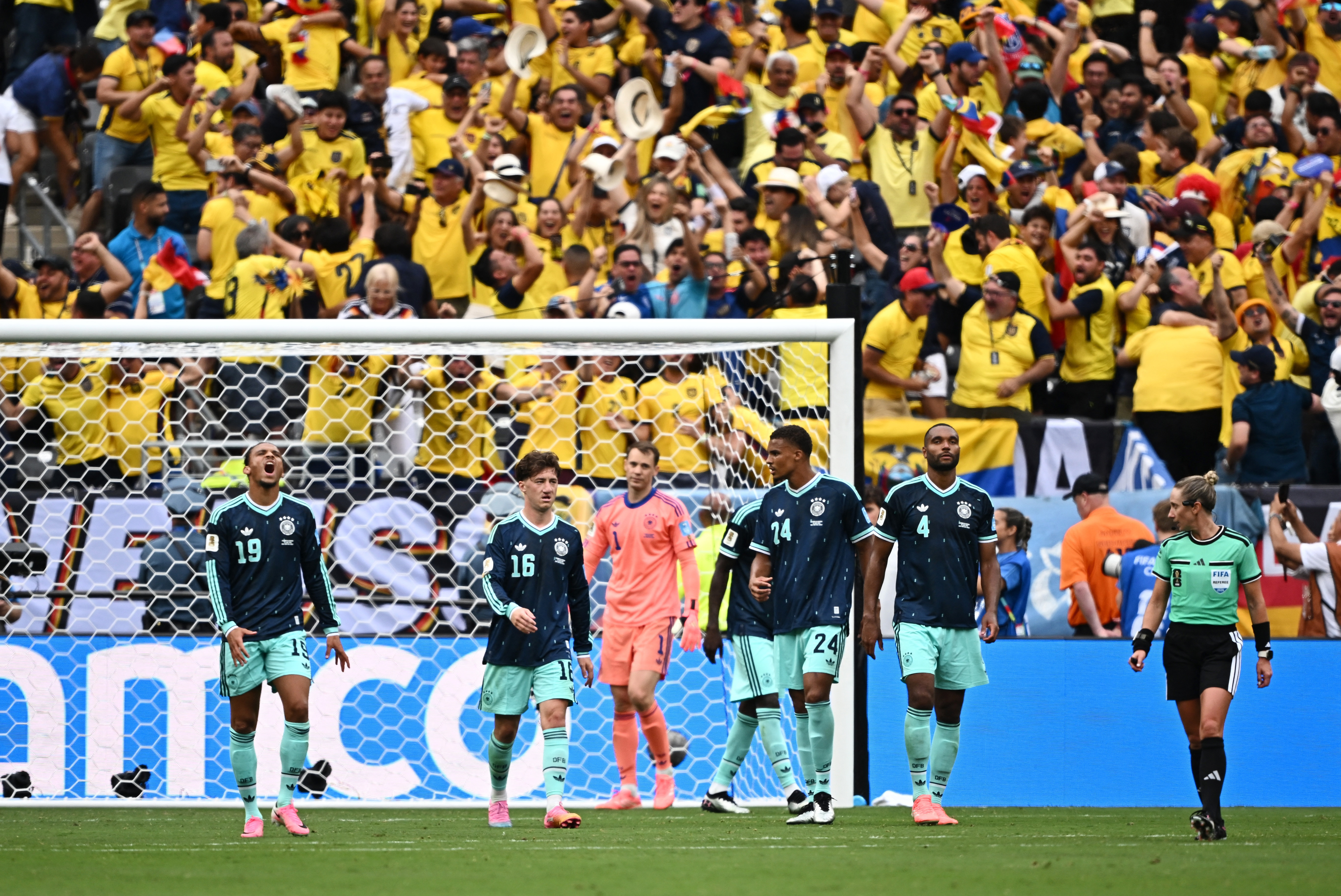 Soccer Football - FIFA World Cup 2026 - Group E - Ecuador v Germany - New York/New Jersey Stadium, East Rutherford, New Jersey, U.S. - June 25, 2026 Germany's Leroy Sane with teammates look dejected after Ecuador's Gonzalo Plata scores their second goal R
