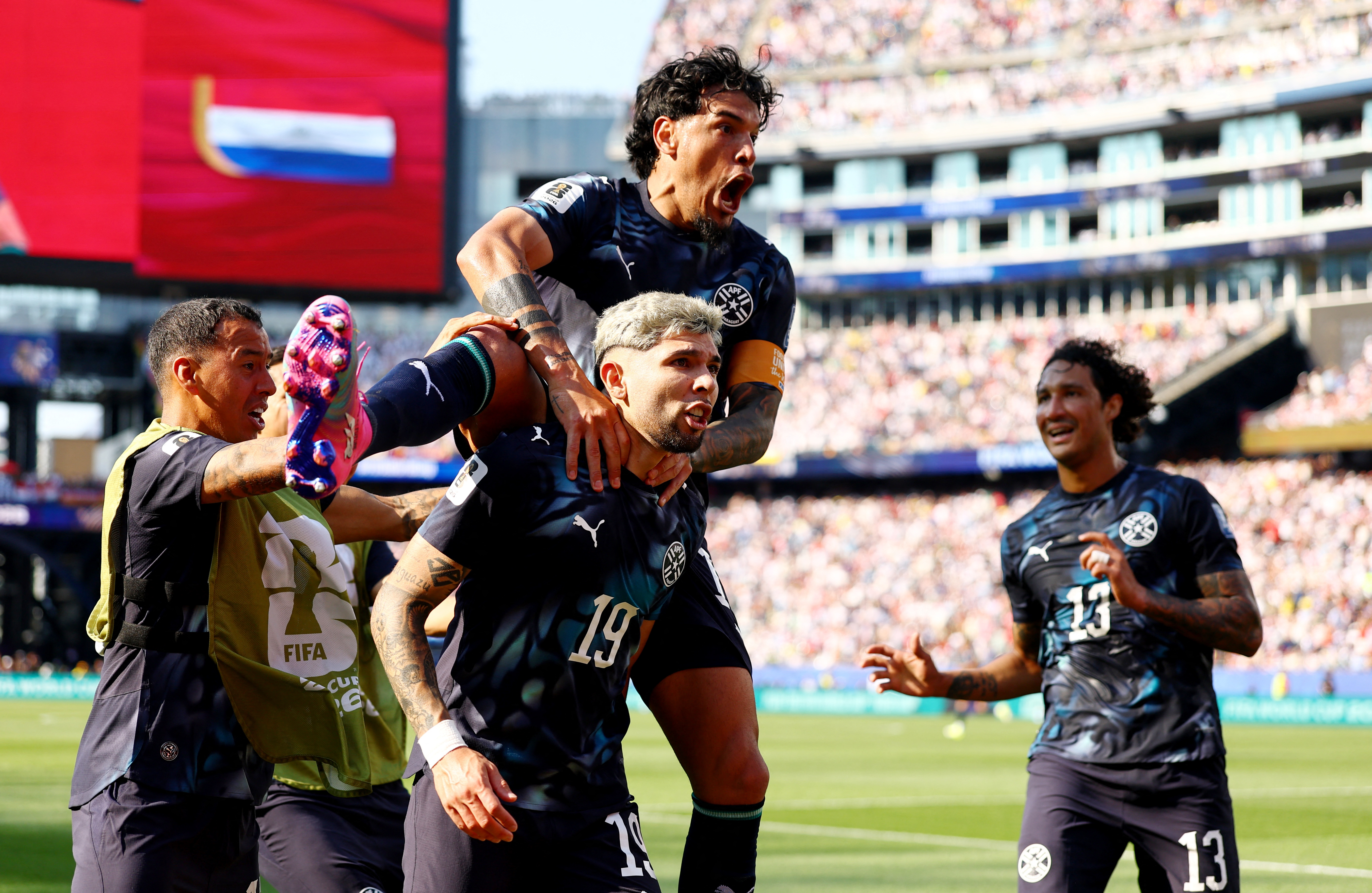 Soccer Football - FIFA World Cup 2026 - Round of 32 - Germany v Paraguay - Boston Stadium, Foxborough, Massachusetts, U.S. - June 29, 2026 Paraguay's Julio Enciso celebrates scoring their first goal with Gustavo Gomez REUTERS/Peter Cziborra