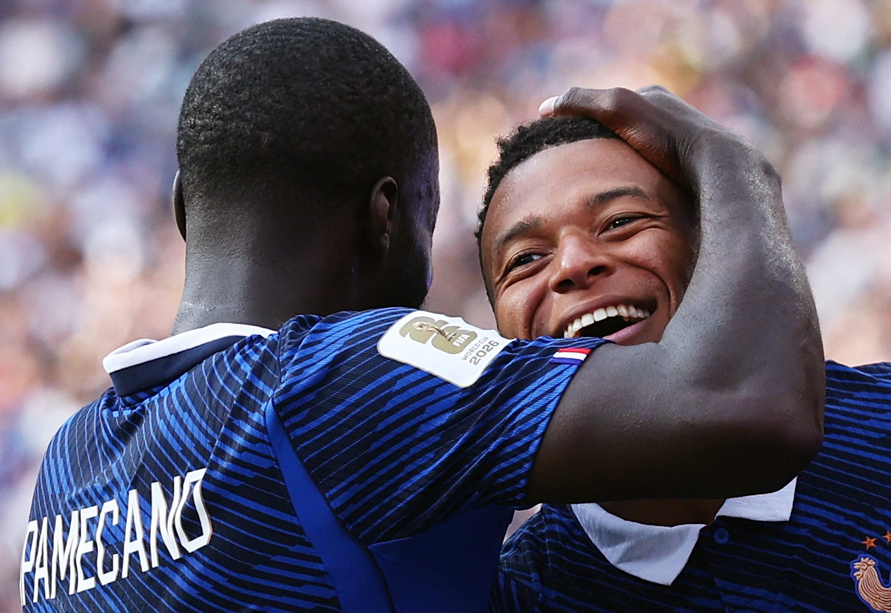 Soccer Football - FIFA World Cup 2026 - Round of 32 - France v Sweden - New York New Jersey Stadium, East Rutherford, New Jersey, U.S. - June 30, 2026 France's Kylian Mbappe celebrates scoring their third goal with Dayot Upamecano IMAGN IMAGES via Reuters