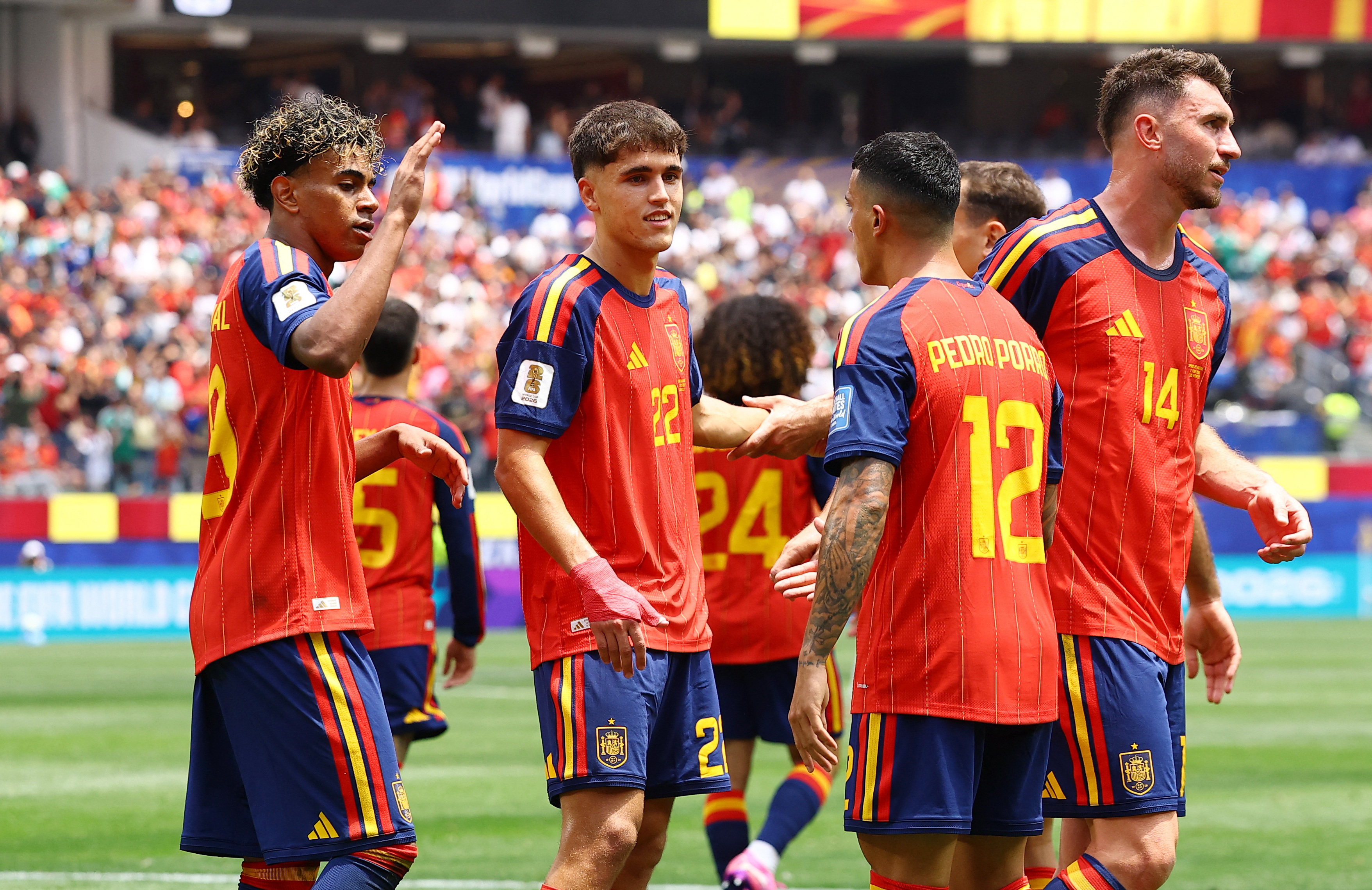 2026-07-Soccer Football - FIFA World Cup 2026 - Round of 32 - Spain v Austria - Los Angeles Stadium, Inglewood, California, U.S. - July 2, 2026 Spain's Pedro Porro celebrates scoring their second goal with Lamine Yamal and Pau Cubarsi-WORLDCUP-ESP-AUT.JPG