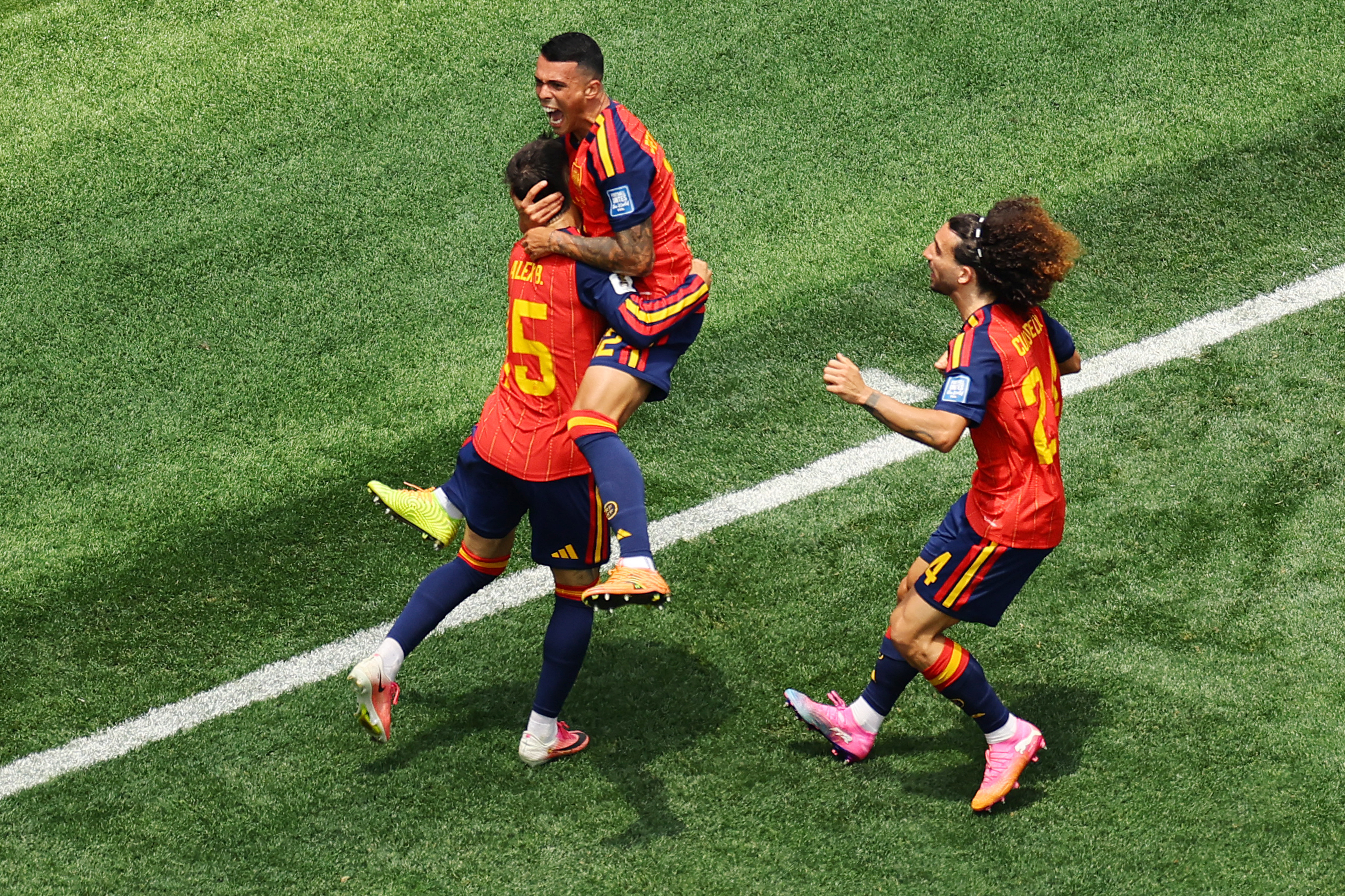 Soccer Football - FIFA World Cup 2026 - Round of 32 - Spain v Austria - Los Angeles Stadium, Inglewood, California, U.S. - July 2, 2026 Spain's Pedro Porro celebrates scoring their second goal with Marc Cucurella and Alex Baena REUTERS/Daniel Cole