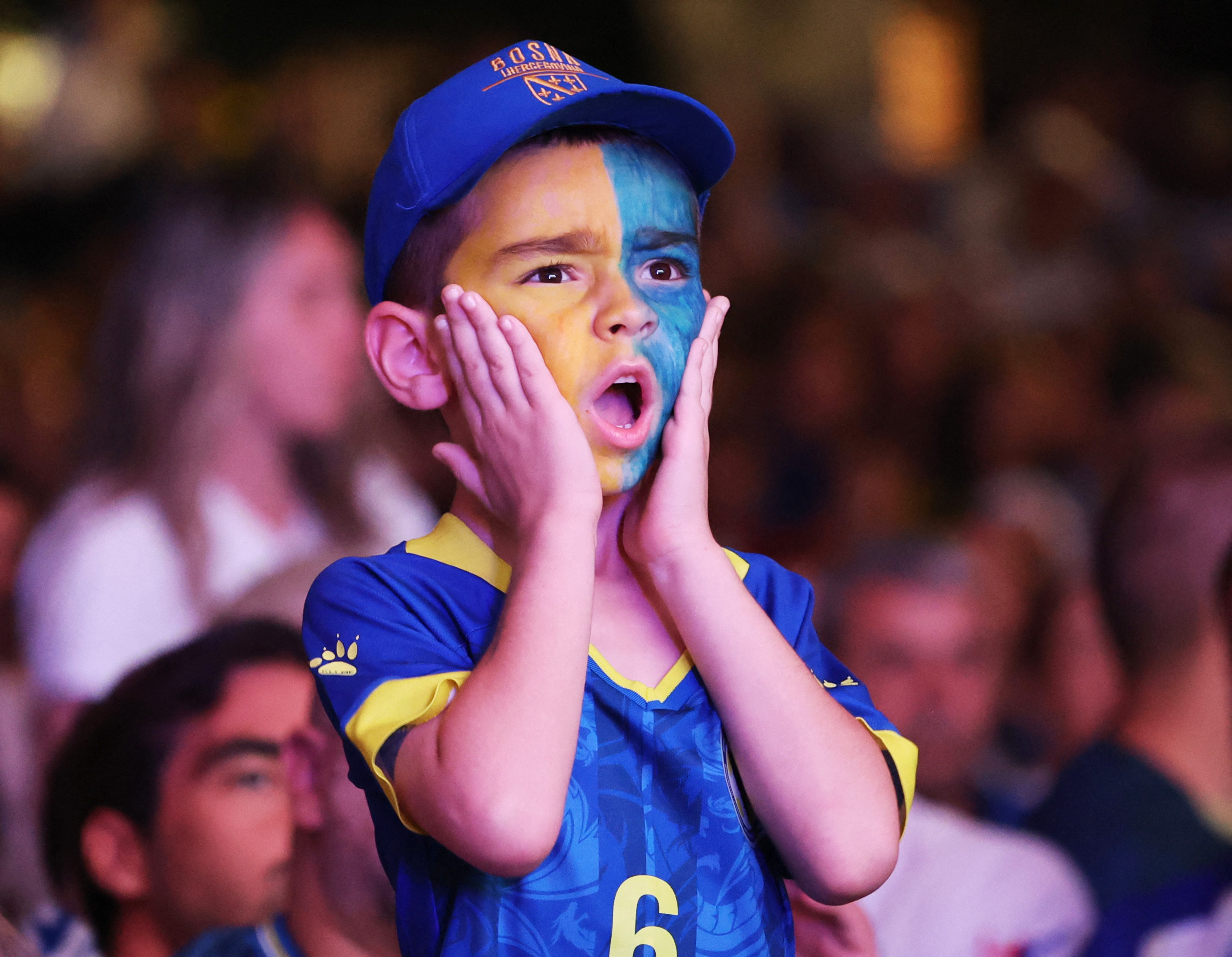 2026-07-02T013243Z_1287154063_UP1EM7204AIZN_RTRMADP_3_SOCCER-WORLDCUP-USA-BIH-FANS-SARAJEVO