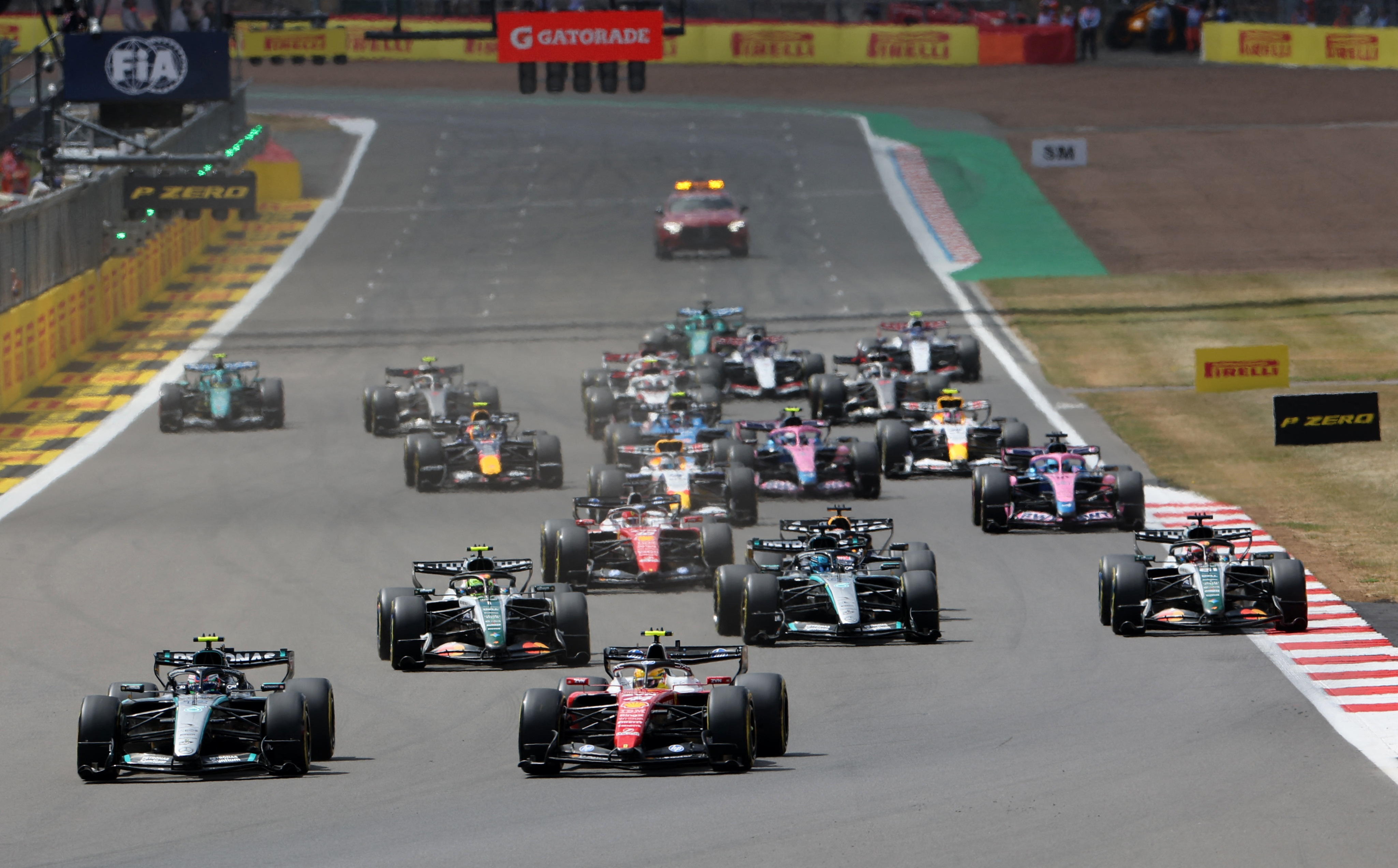 Formula One F1 - British Grand Prix - Silverstone Circuit, Silverstone, Britain - July 4, 2026 Ferrari's Lewis Hamilton, Mercedes' Andrea Kimi Antonelli and drivers in action at the start of the sprint race REUTERS/Suzanne Plunkett