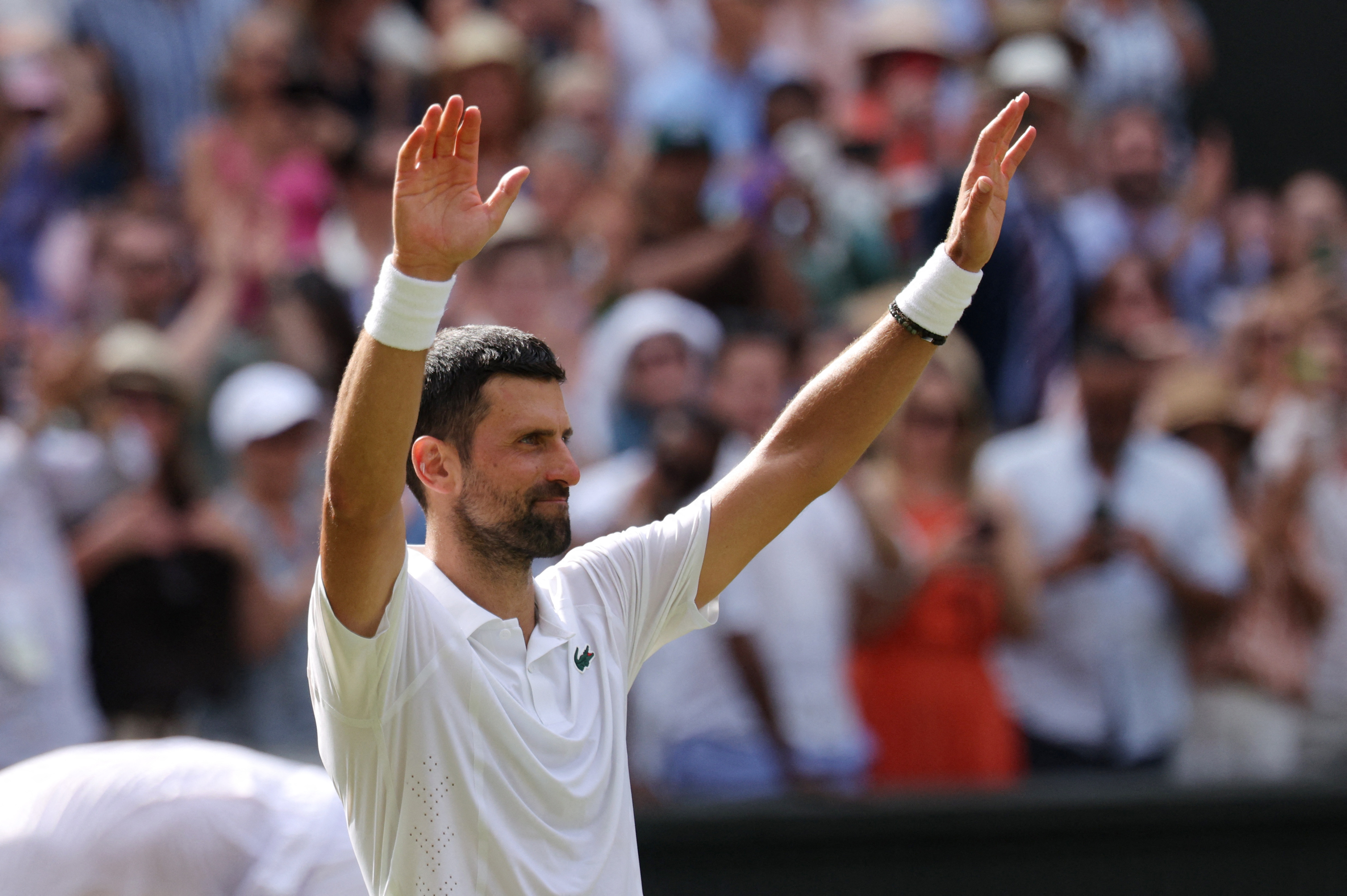 2026-07-Tennis - Wimbledon - All England Lawn Tennis and Croquet Club, London, Britain - July 5, 2026 Serbia's Novak Djokovic celebrates after winning his fourth round match against Russia's Roman Safiullin REUTERS/Marko Djurica-WIMBLEDON