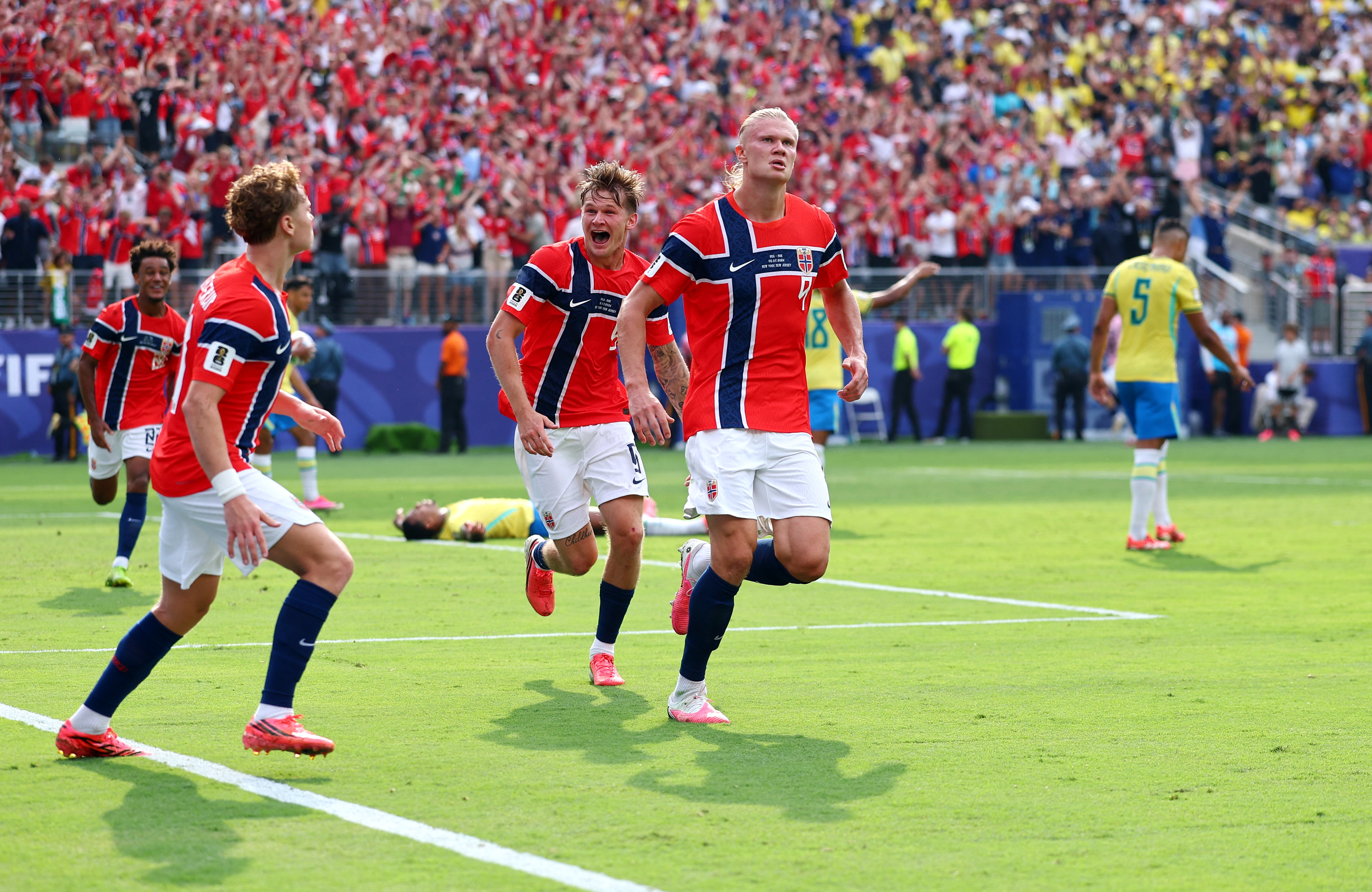 Soccer Football - FIFA World Cup 2026 - Round of 16 - Brazil v Norway - New York New Jersey Stadium, East Rutherford, New Jersey, U.S. - July 5, 2026 Norway's Erling Haaland celebrates scoring their first goal with David Moller Wolfe and Andreas Schjelder