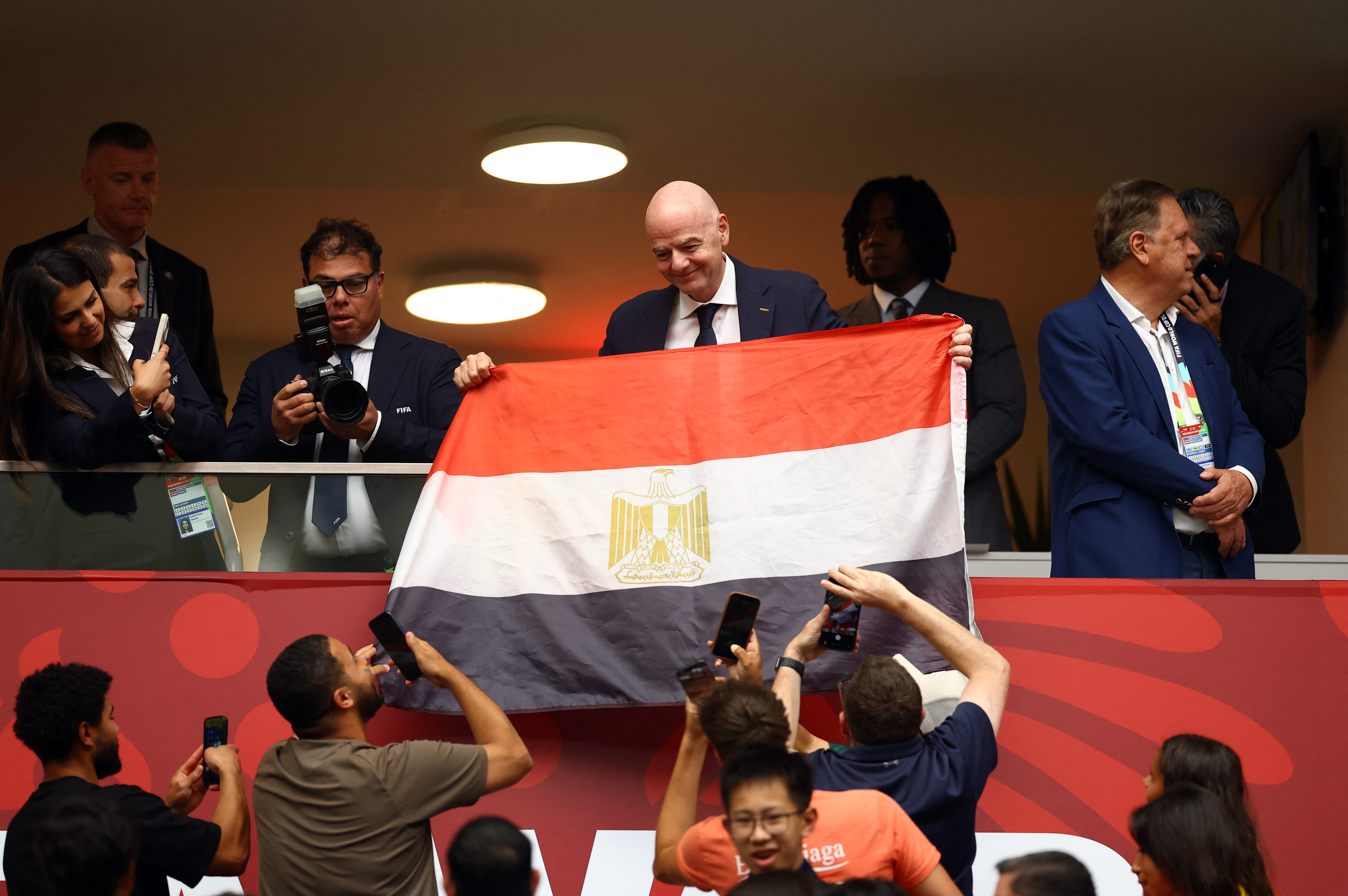Soccer Football - FIFA World Cup 2026 - Round of 16 - Switzerland v Colombia - BC Place, Vancouver, Canada - July 7, 2026 FIFA president Gianni Infantino poses for a photo with an Egypt flag inside the stadium before the match REUTERS/Albert Gea