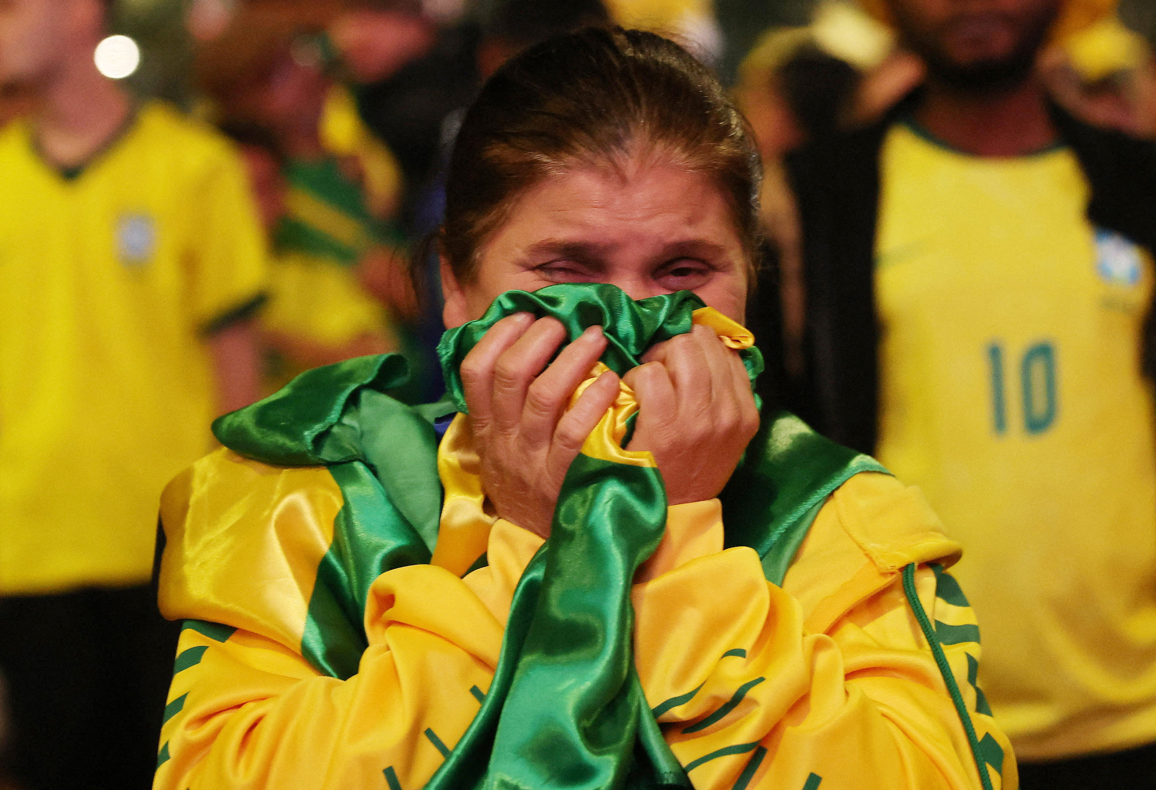 Soccer Football - FIFA World Cup 2026 - Round of 16 - Brazil v Norway - Fans gather in Sao Paulo - Sao Paulo, Brazil - July 5, 2026 Brazil fan looks dejected after the match in Sao Paulo as Brazil are eliminated from the World Cup REUTERS/Tuane Fernandes