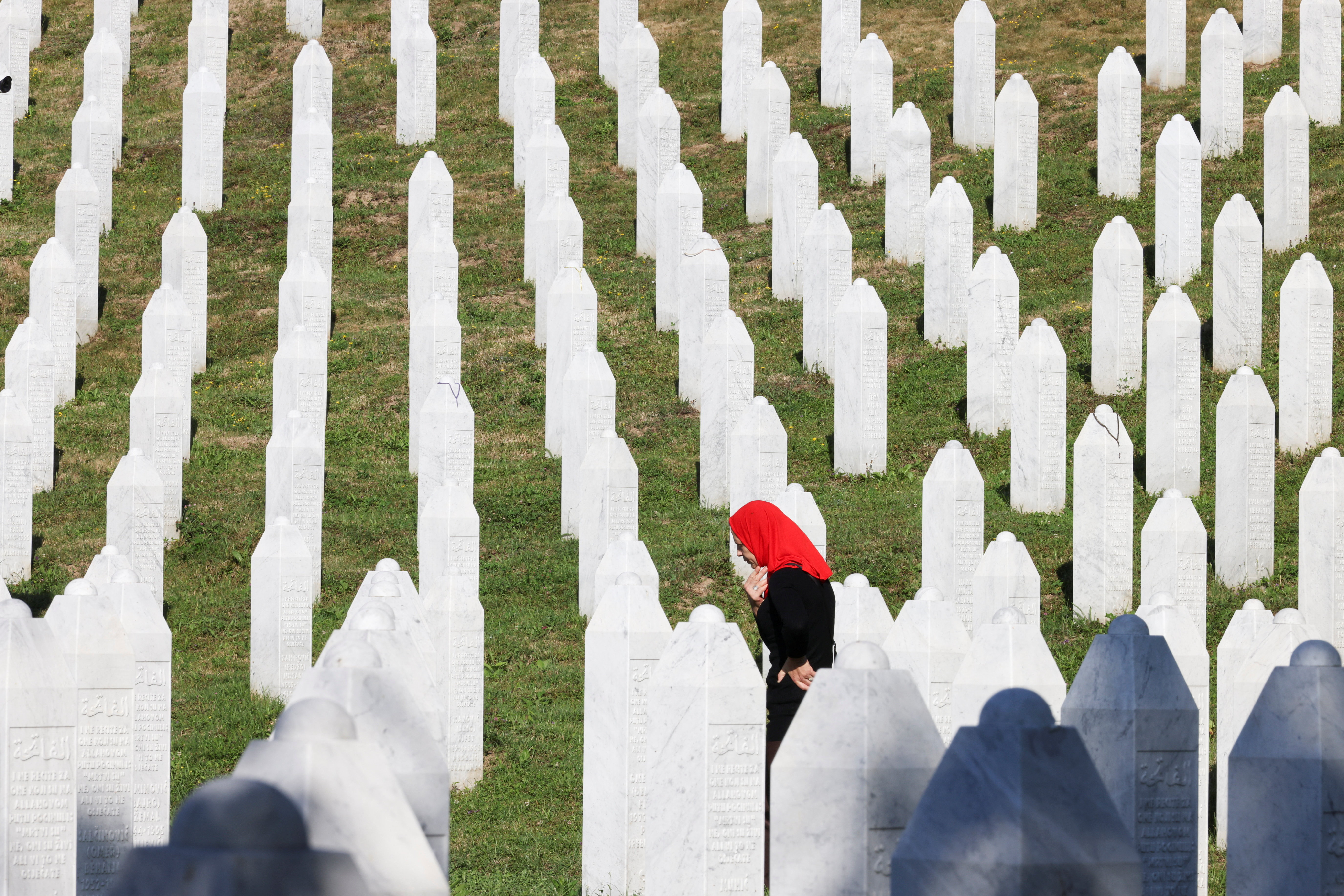 A Bosnian woman searches for her family members