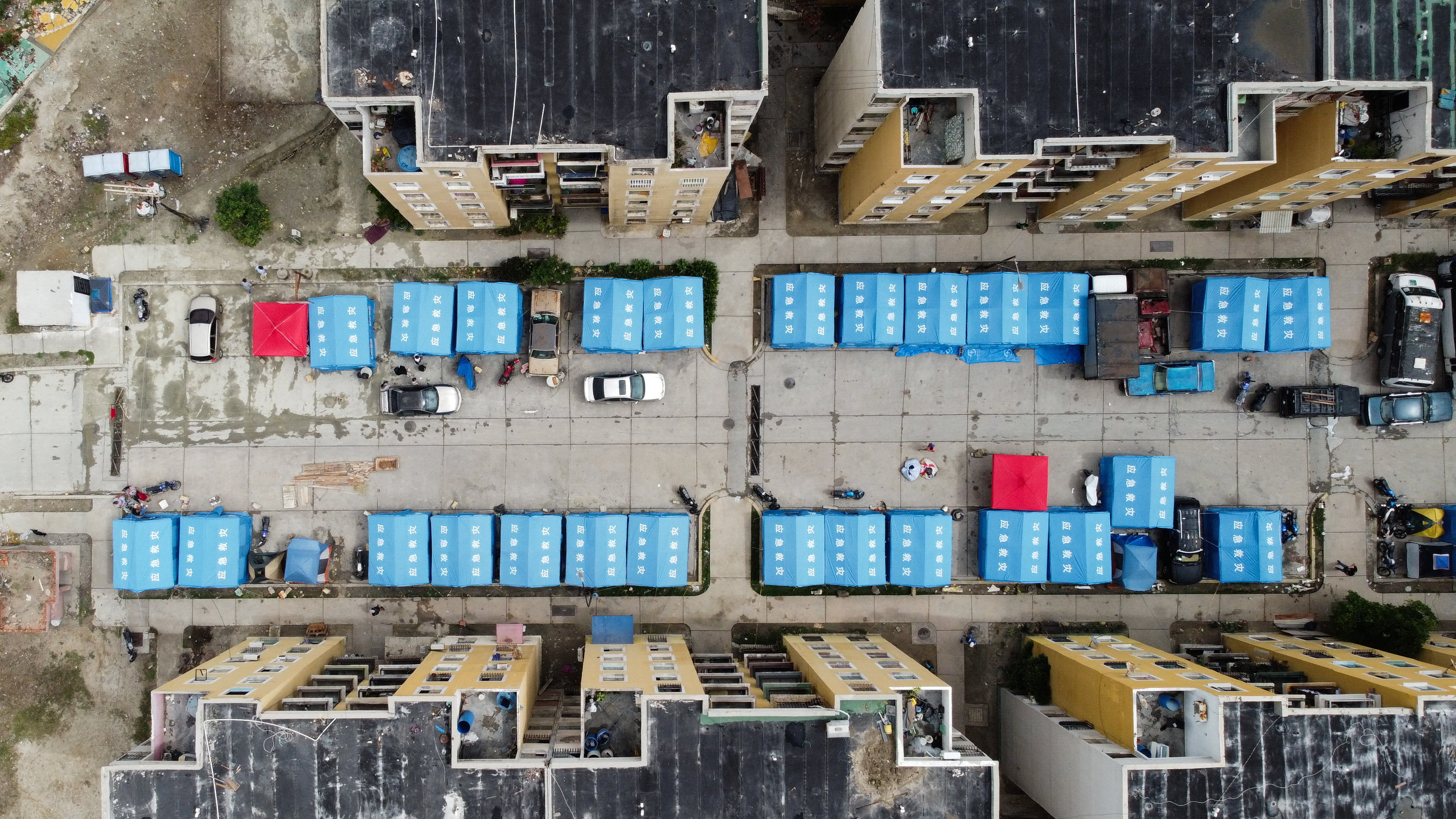 A drone view shows medical tents for people displaced by the June