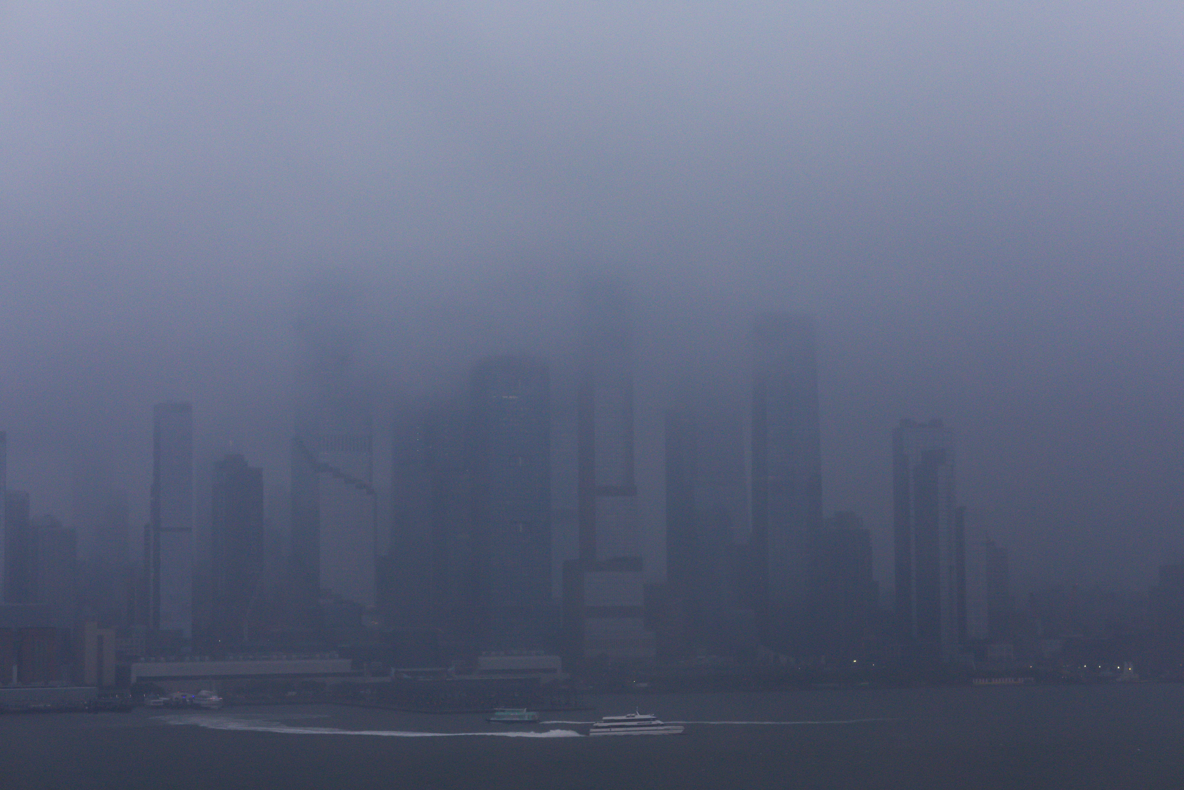 A ferry boat moves along the Hudson River  during a rain storm in New York City, U.S., June 22, 2026. REUTERS/Eduardo Munoz