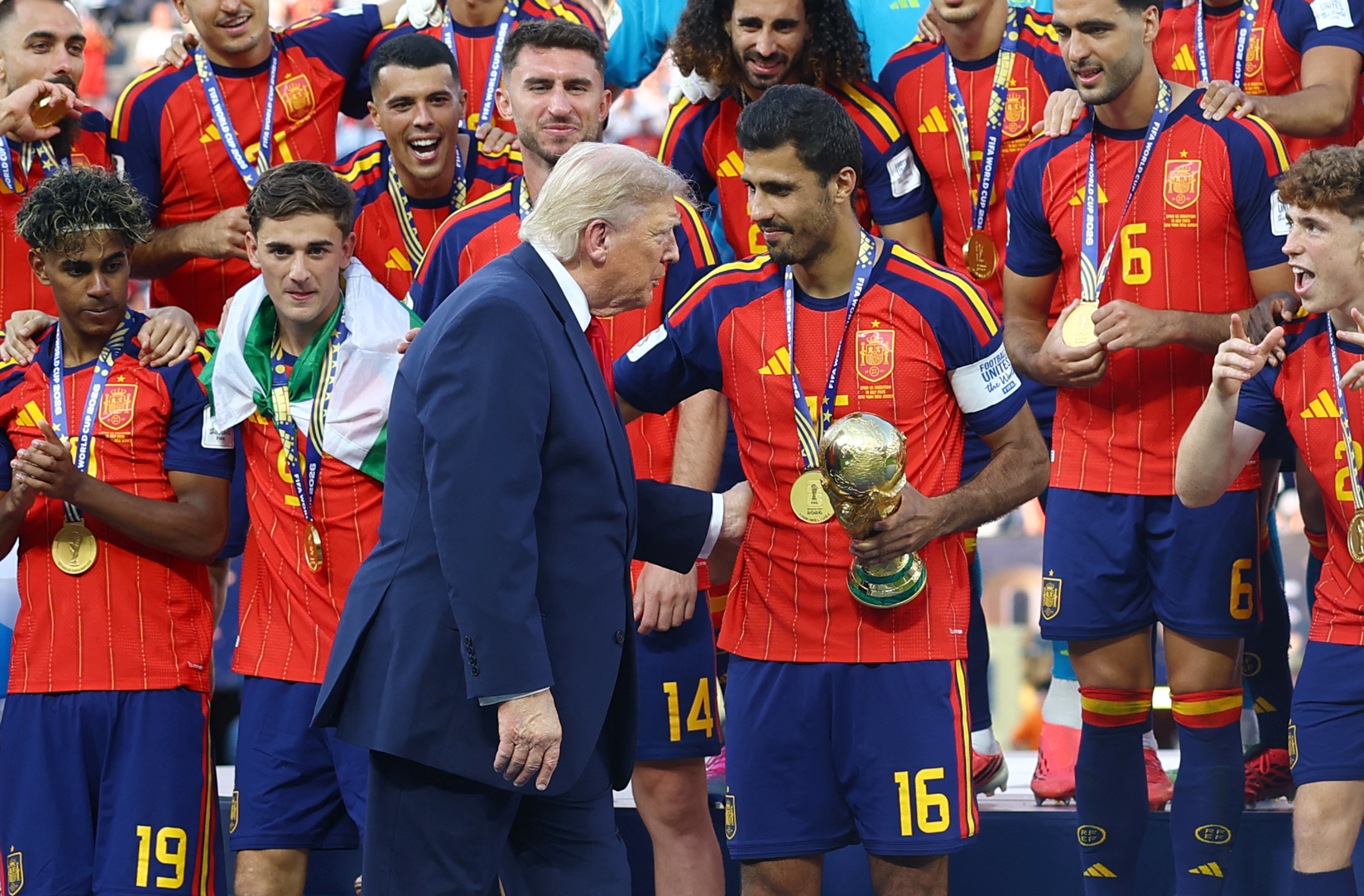 Soccer Football - FIFA World Cup 2026 - Final - Spain v Argentina - New York New Jersey Stadium, East Rutherford, New Jersey, U.S. - July 19, 2026 U.S. President Donald Trump with Spain's Rodri ahead of the trophy lift REUTERS/Hannah Mckay