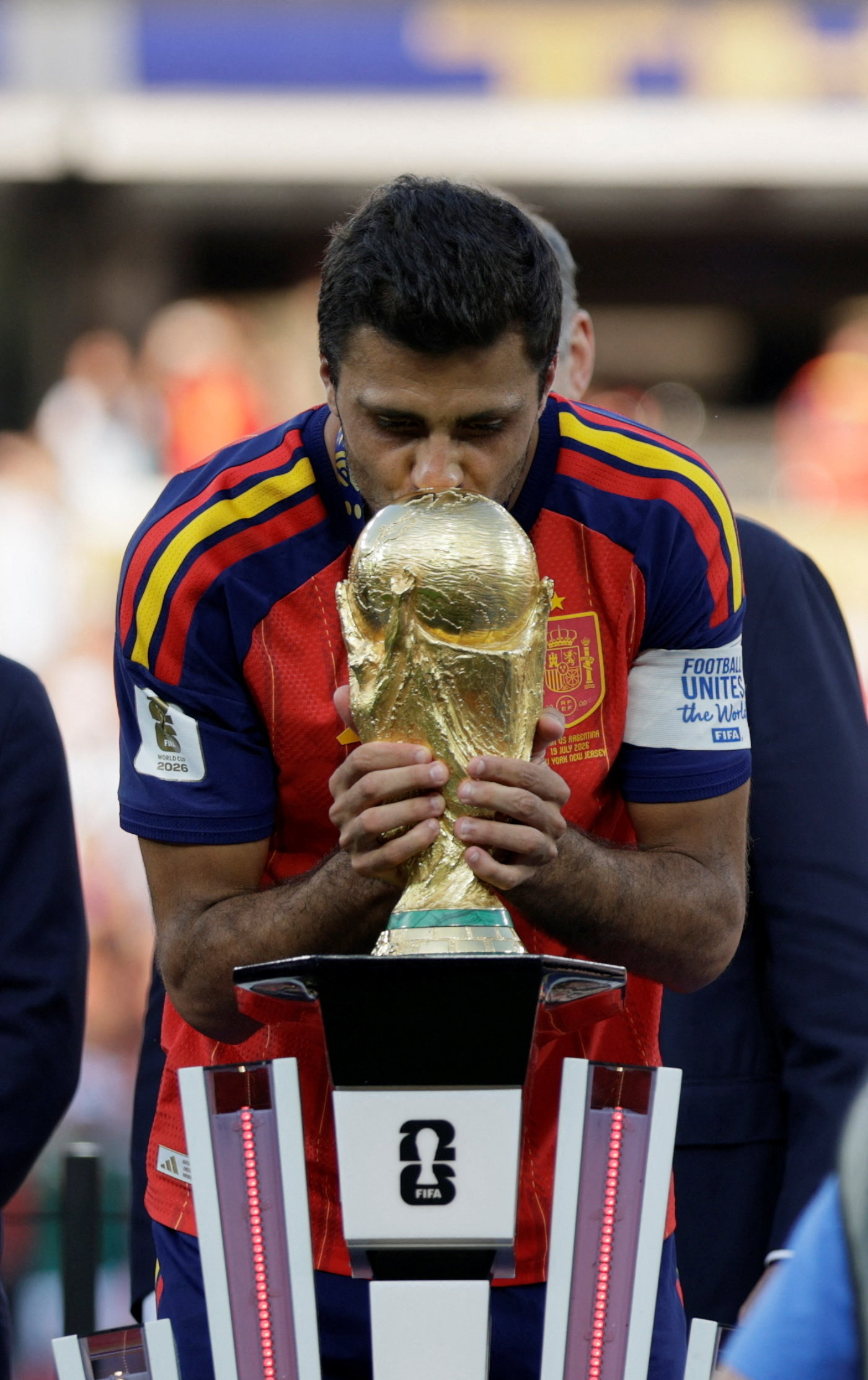 Spain's Rodri kisses the World Cup trophy during the trophy presentation after the FIFA World Cup 2026 Final, in New York New Jersey Stadium, East Rutherford, New Jersey, U.S., July 19, 2026. REUTERS/Evan Vucci