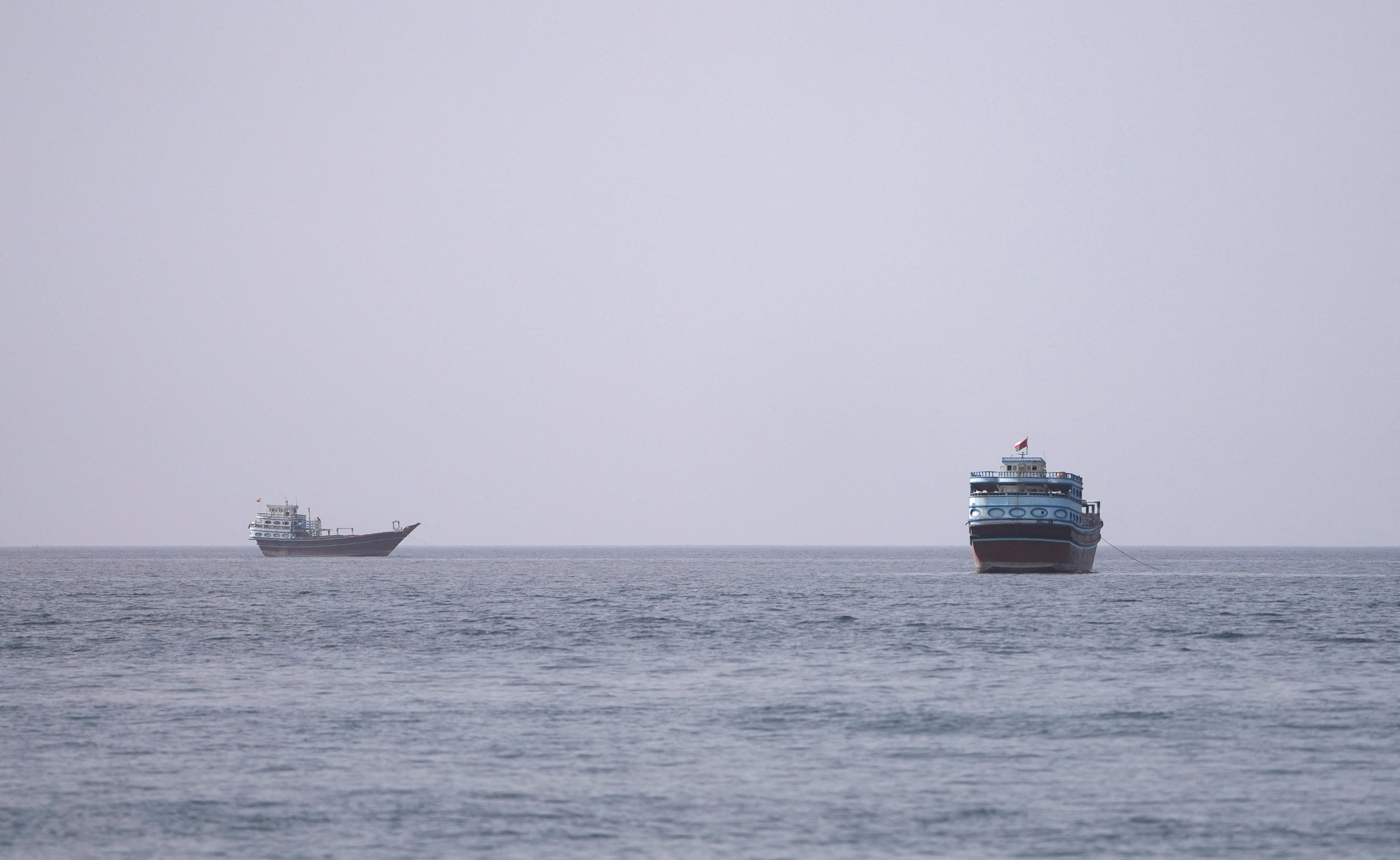 FILE PHOTO: Vessels at the Strait of Hormuz, as seen from Musandam, Oman, July 17, 2026. REUTERS/Stringer/File Photo