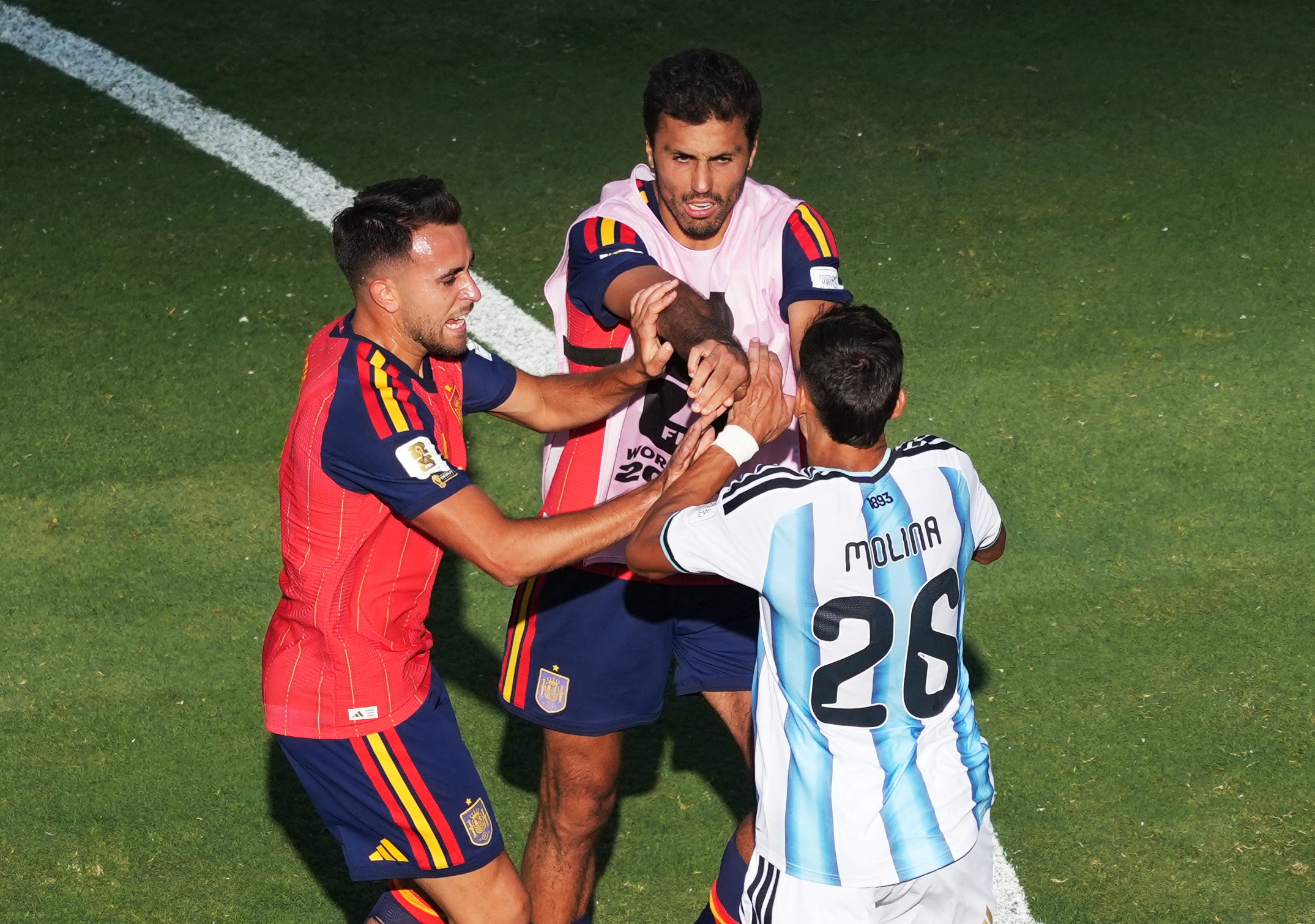 Soccer Football - FIFA World Cup 2026 - Final - Spain v Argentina - New York/New Jersey Stadium, East Rutherford, New Jersey, U.S. - July 19, 2026 Spain's Rodri and Argentina's Nahuel Molina clash after the match IMAGN IMAGES via Reuters/James Lang