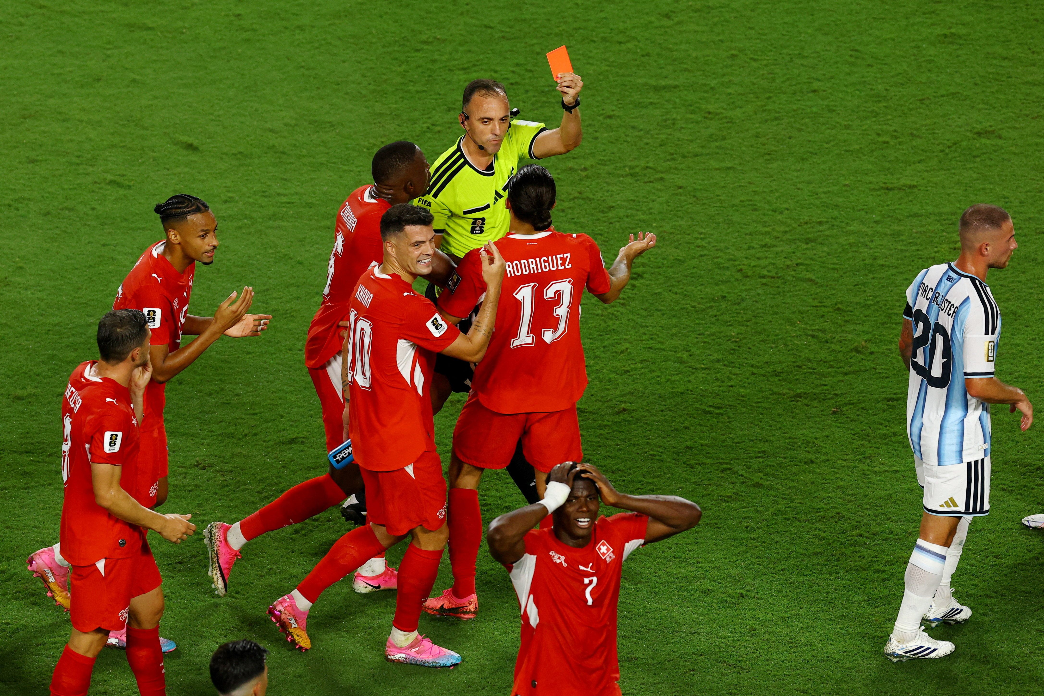 Soccer Football - FIFA World Cup 2026 - Quarter Final - Argentina v Switzerland - Kansas City Stadium, Kansas City, Missouri, U.S. - July 11, 2026 Switzerland's Breel Embolo is shown a red card by referee Joao Pinheiro after a