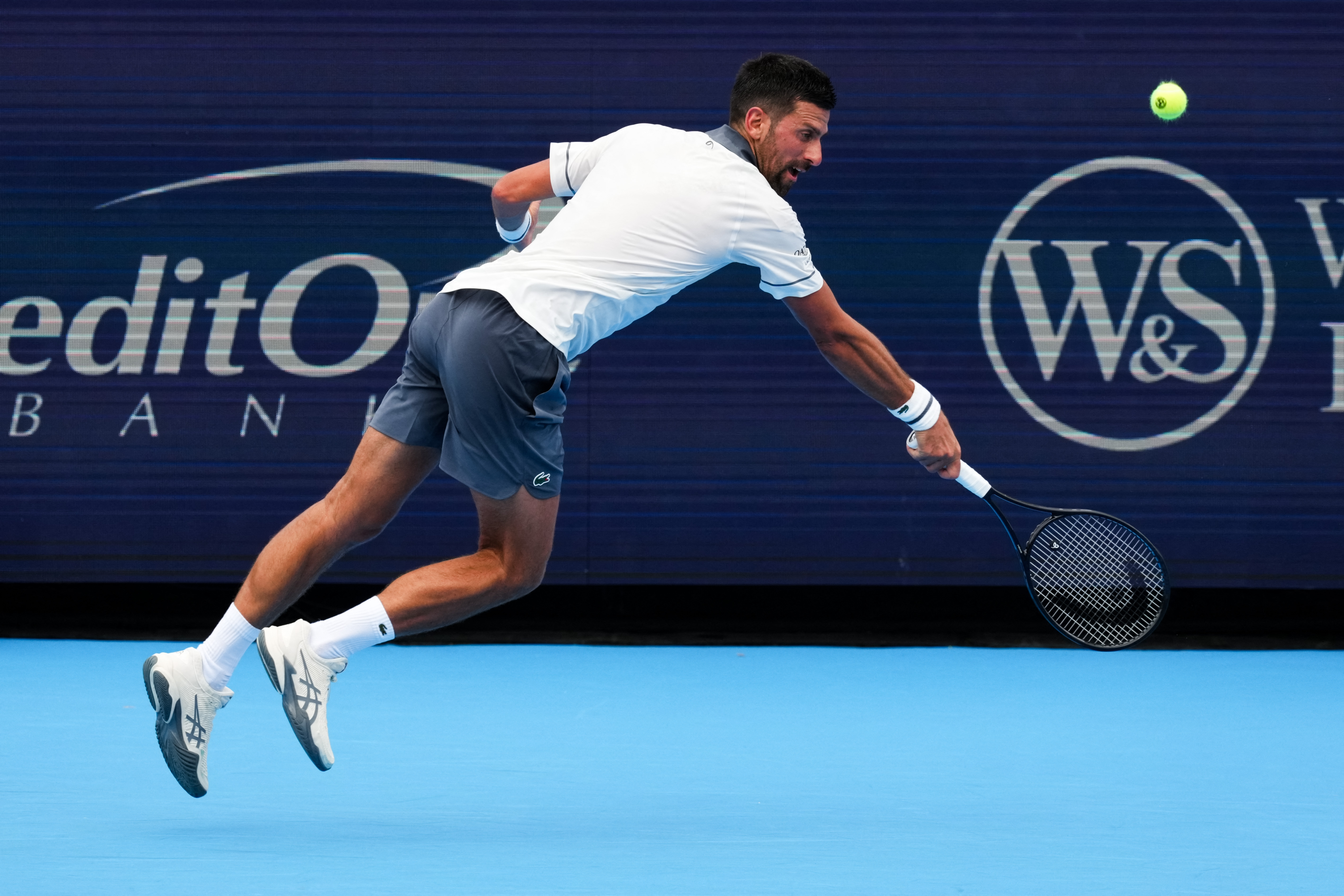 Aug 15, 2026; Mason, OH, USA;  Novak Djokovic (SRB) leaps as he attempts to return