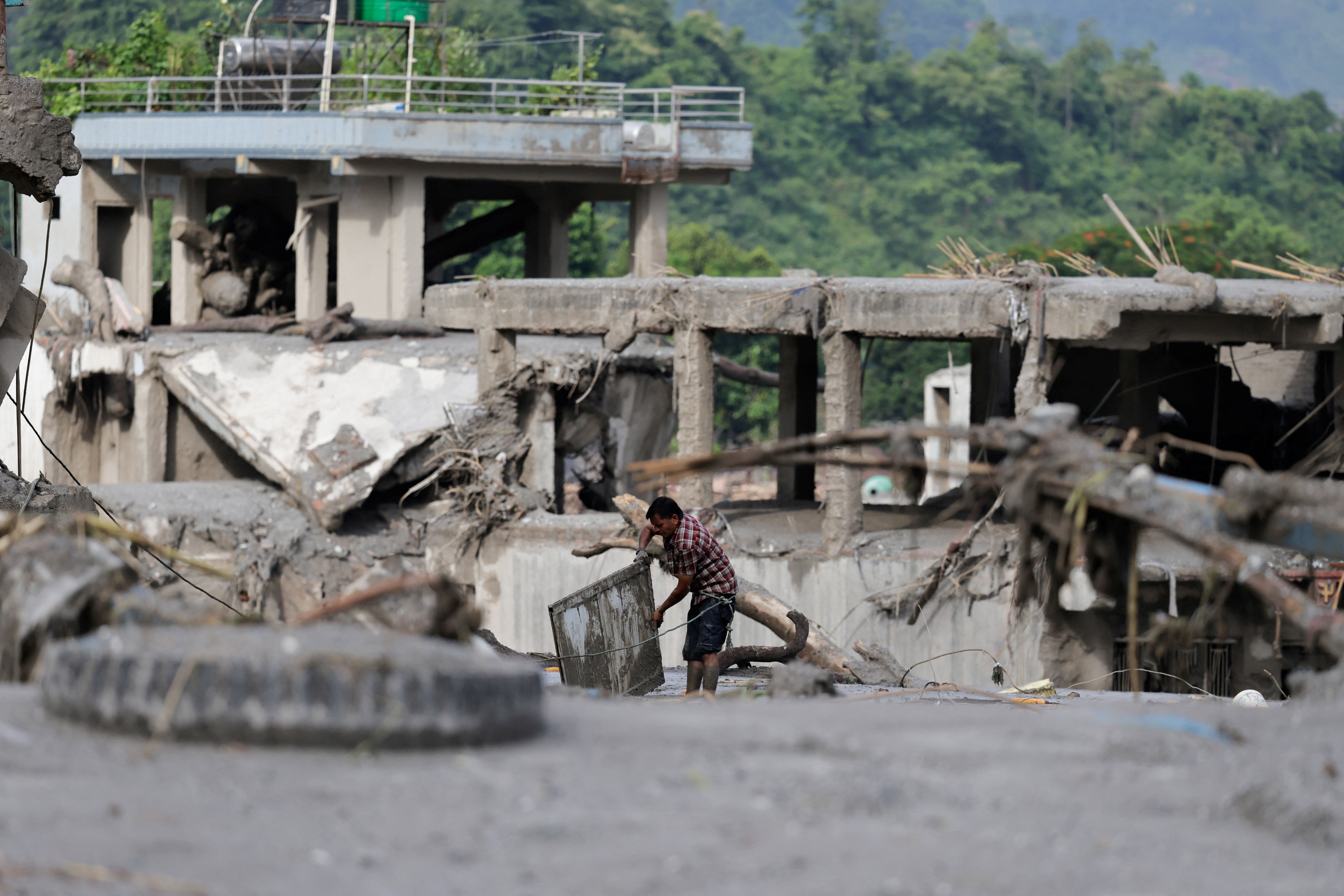 2026-08-27T034410Z_1747923945_RC2Q6NA13DTP_RTRMADP_3_NEPAL-FLOODS.JPG
