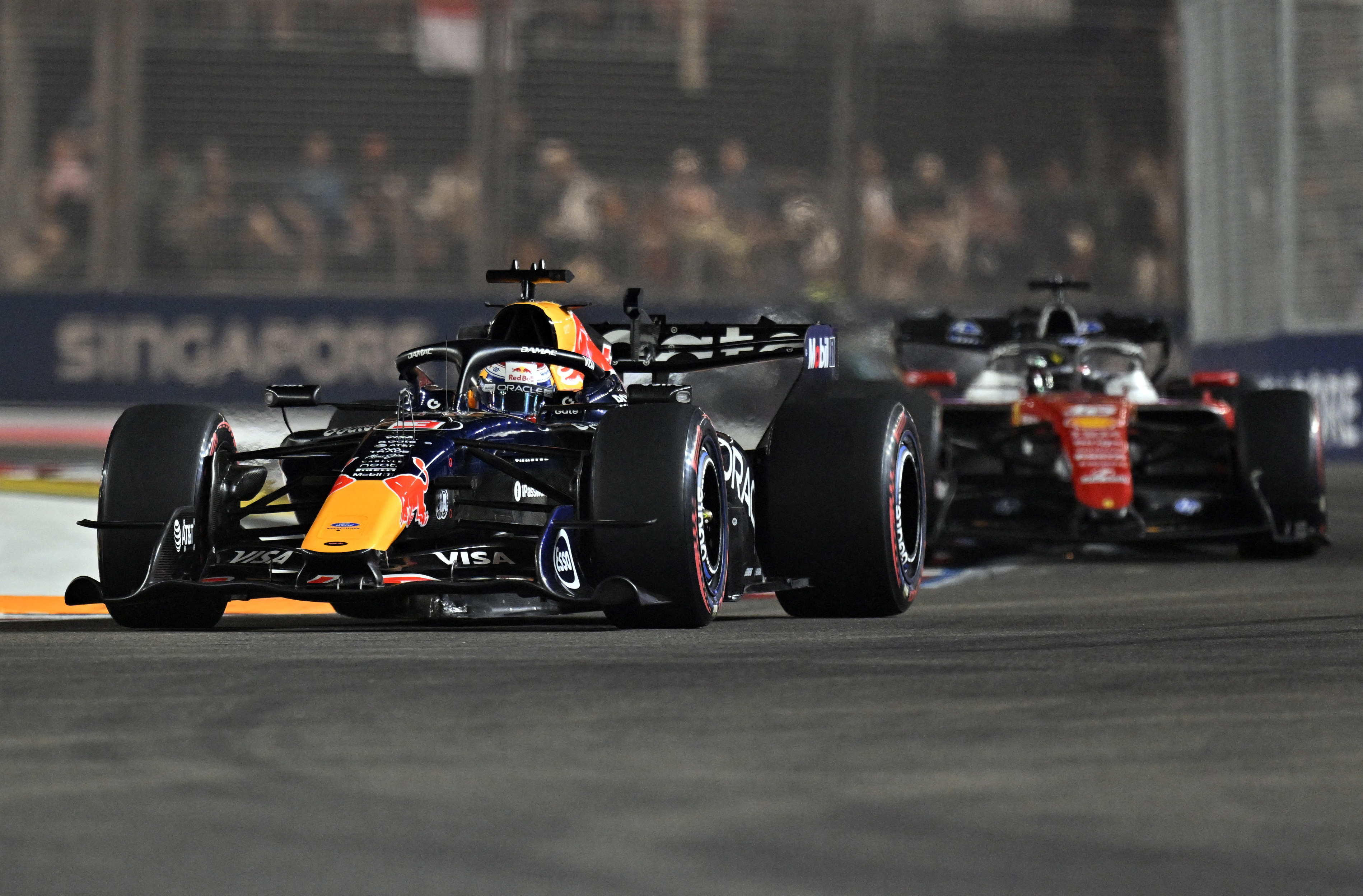 Formula One F1 - Singapore Grand Prix - Marina Bay Street Circuit, Singapore - October 11, 2026 Red Bull's Max Verstappen in action during the race REUTERS/Caroline Chia