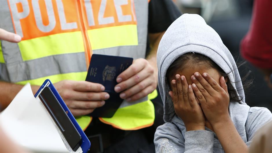 2015-09-17T142146Z_1126858833_LR2EB9H13VZ8M_RTRMADP_3_EUROPE-MIGRANTS-GERMANY