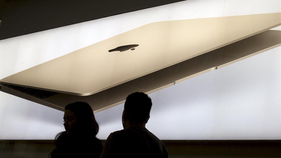 2015-10-27T231015Z_1160540320_GF20000035647_RTRMADP_3_APPLE-RESULTS