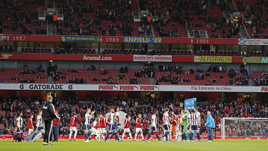 2016-04-21T184433Z_104265873_MT1ACI14357609_RTRMADP_3_SOCCER-ENGLAND-ARS-WBA