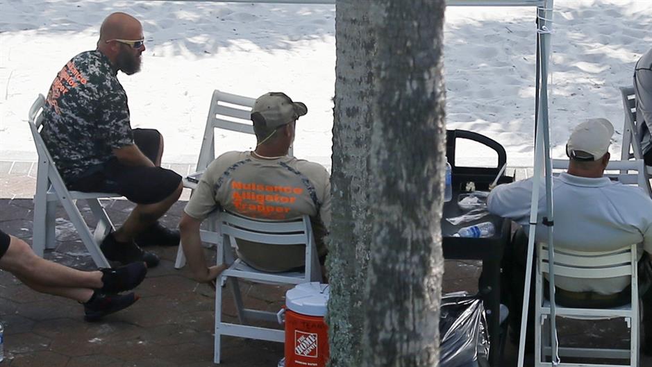 2016-06-15T194548Z_1055169895_TM3EC6F17KP01_RTRMADP_3_US-FLORIDA-ALLIGATOR-CHILD