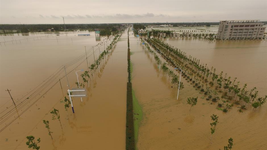 2016-07-04T085359Z_657028000_S1AETNPNCXAB_RTRMADP_3_CHINA-FLOODS