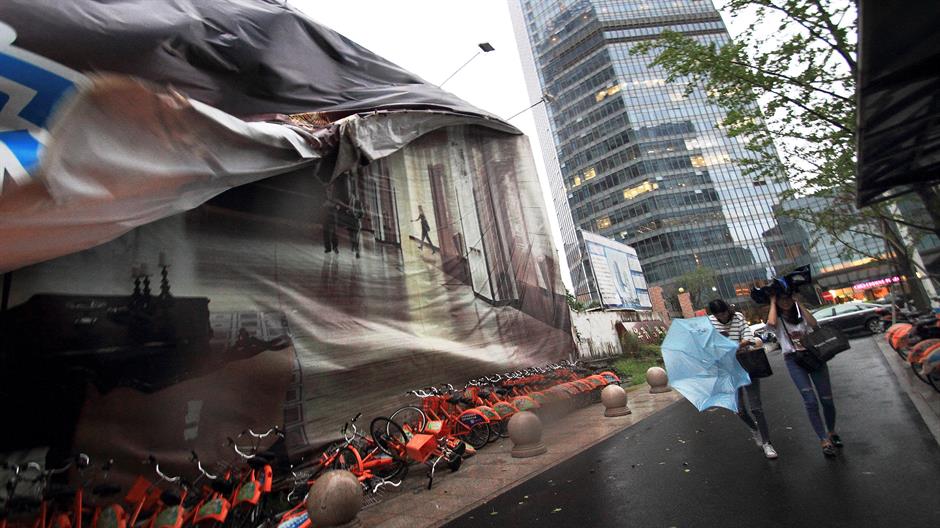 2016-09-29T052153Z_1560043356_S1BEUEALVDAA_RTRMADP_3_ASIA-STORM-CHINA