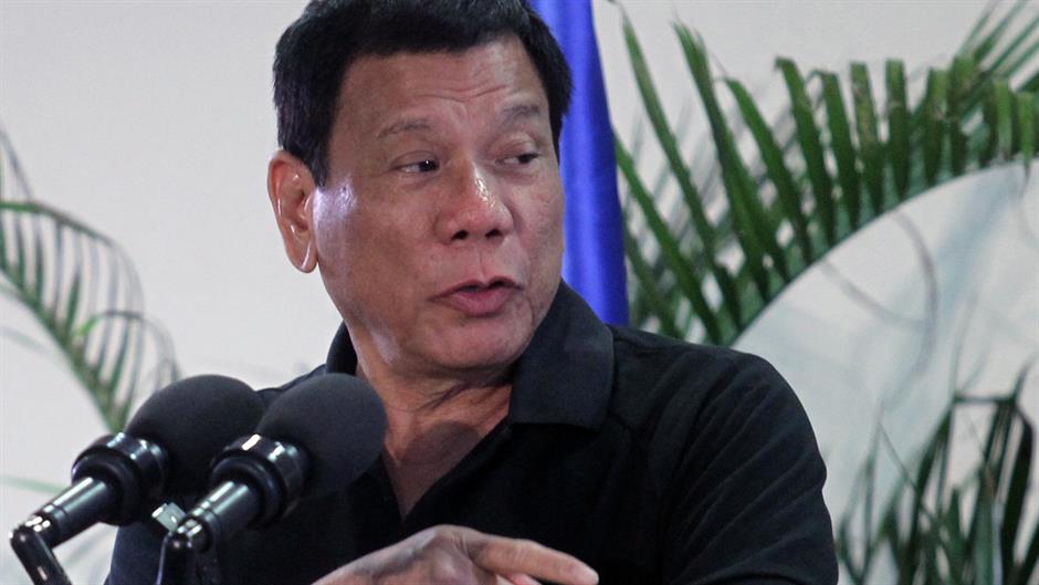 2016-09-30T031630Z_1159132699_S1BEUEEYMWAA_RTRMADP_3_PHILIPPINES-DUTERTE-HITLER