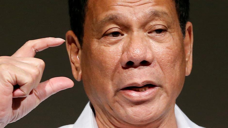 2016-11-02T084817Z_1789009554_S1BEUKMHSBAA_RTRMADP_3_PHILIPPINES-DUTERTE-LABOUR