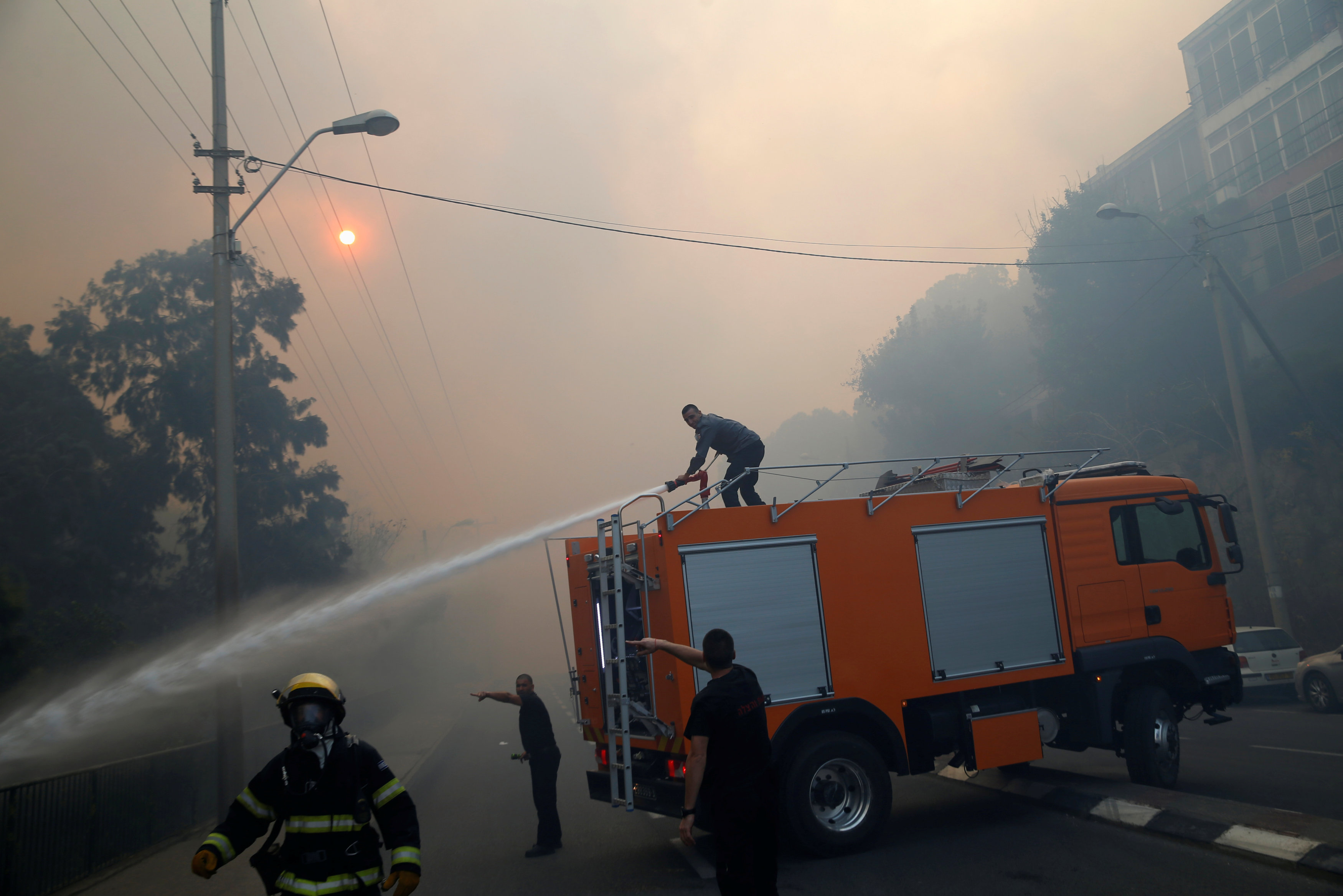 2016-11-24T130725Z_794838909_S1AEUORINTAA_RTRMADP_3_ISRAEL-FIRES