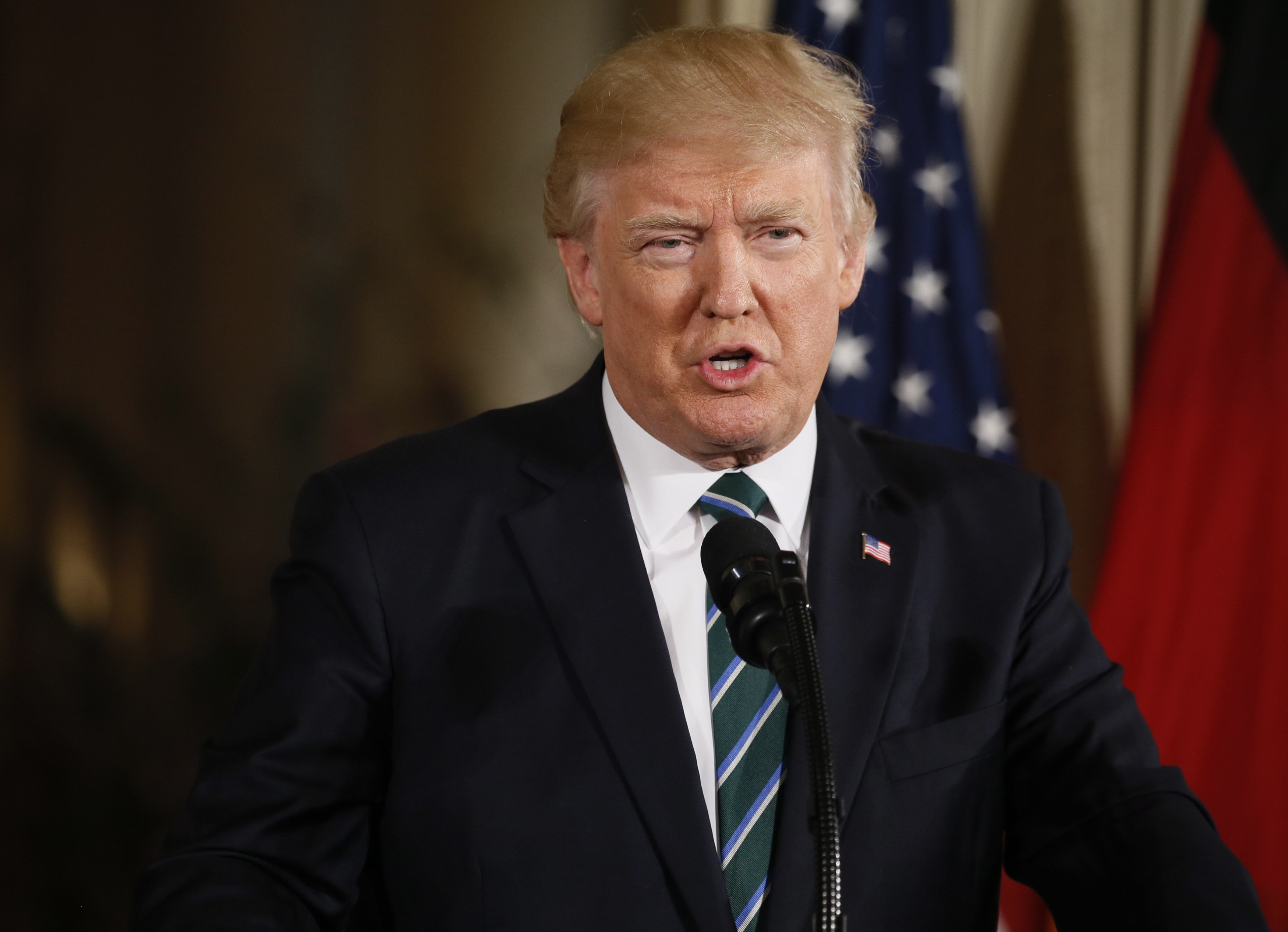 2017-03-17T182629Z_1002368336_HP1ED3H1F84BP_RTRMADP_3_USA-TRUMP-GERMANY