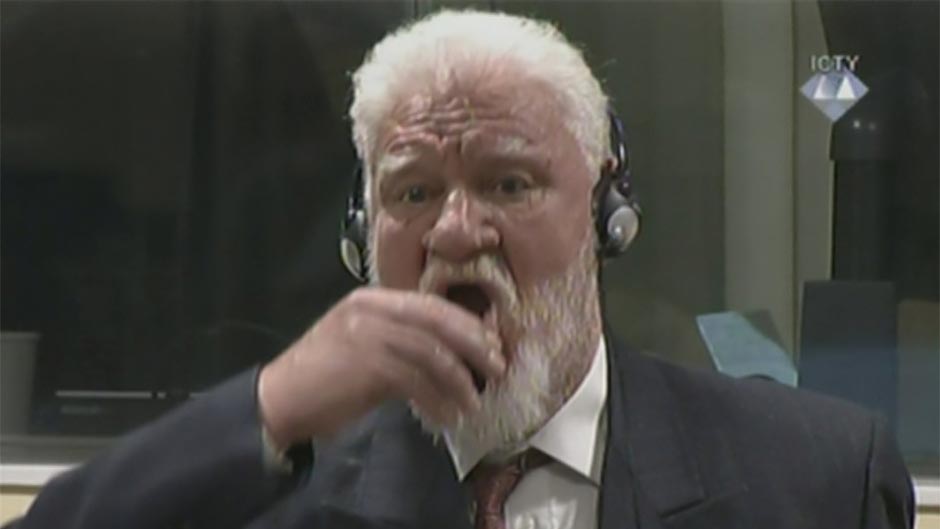 2017-11-29T113028Z_1080010703_RC158D611C20_RTRMADP_3_WARCRIMES-BOSNIA