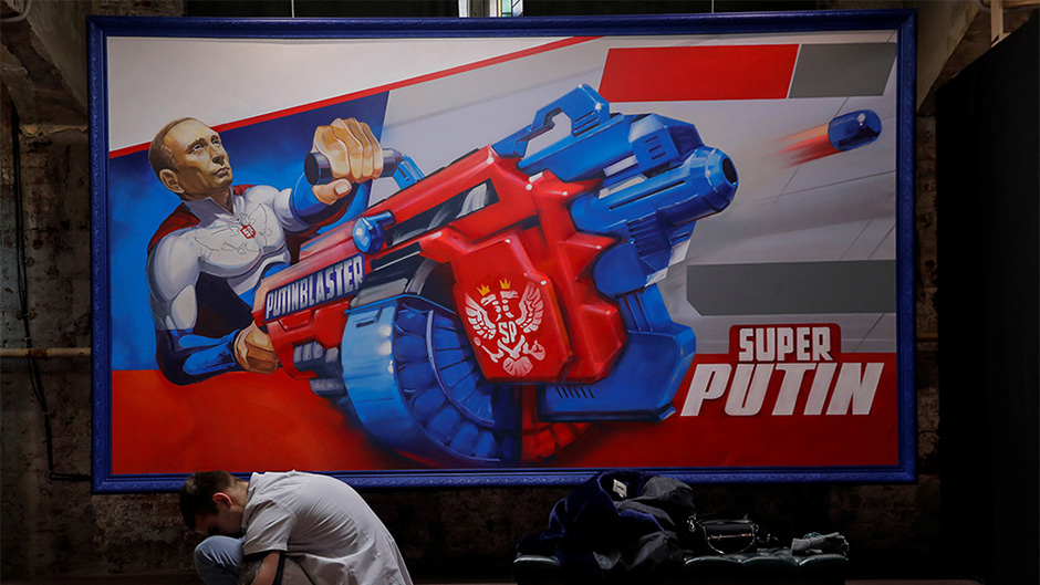 2017-12-06T155032Z_906616682_RC1CAB389840_RTRMADP_3_RUSSIA-PUTIN-ART 1