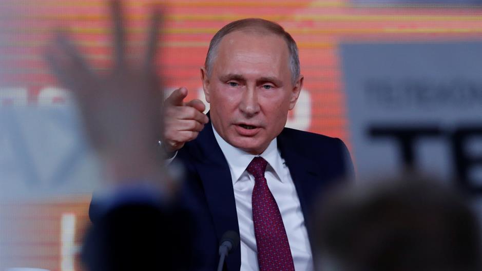 2017-12-14T131212Z_567699262_RC197F7331B0_RTRMADP_3_RUSSIA-PUTIN