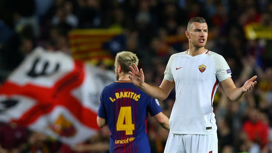 2018-04-04T194100Z_1193669275_RC19BA977A60_RTRMADP_3_SOCCER-CHAMPIONS-FCB-ROM