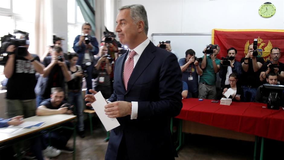 2018-04-15T110143Z_1645702744_RC1E5D6BFC00_RTRMADP_3_MONTENEGRO-ELECTION-CANDIDATES