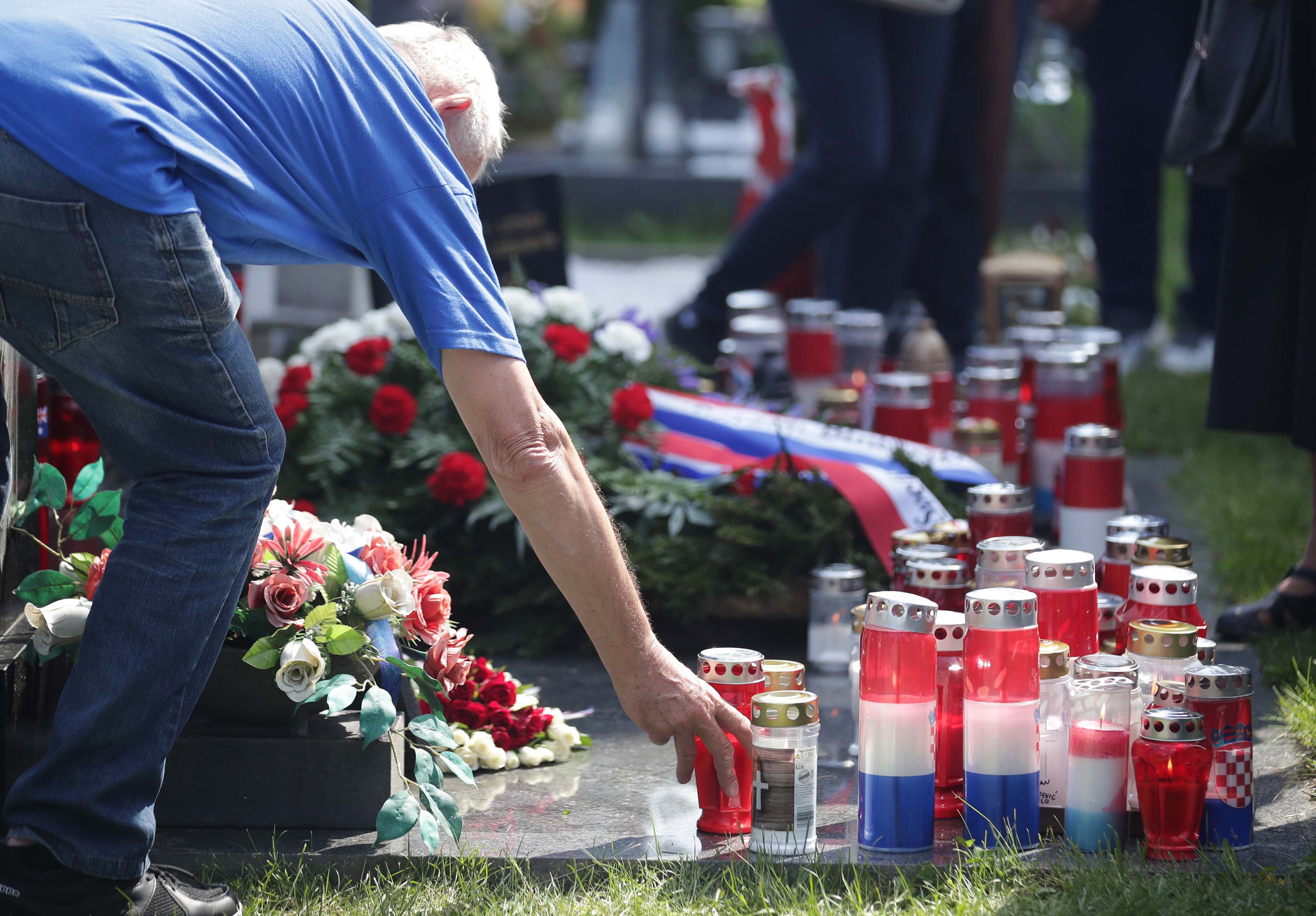 2018-05-12T091751Z_406389343_UP1EE5C0PTQ23_RTRMADP_3_AUSTRIA-CROATIA-WW2-MEMORIAL