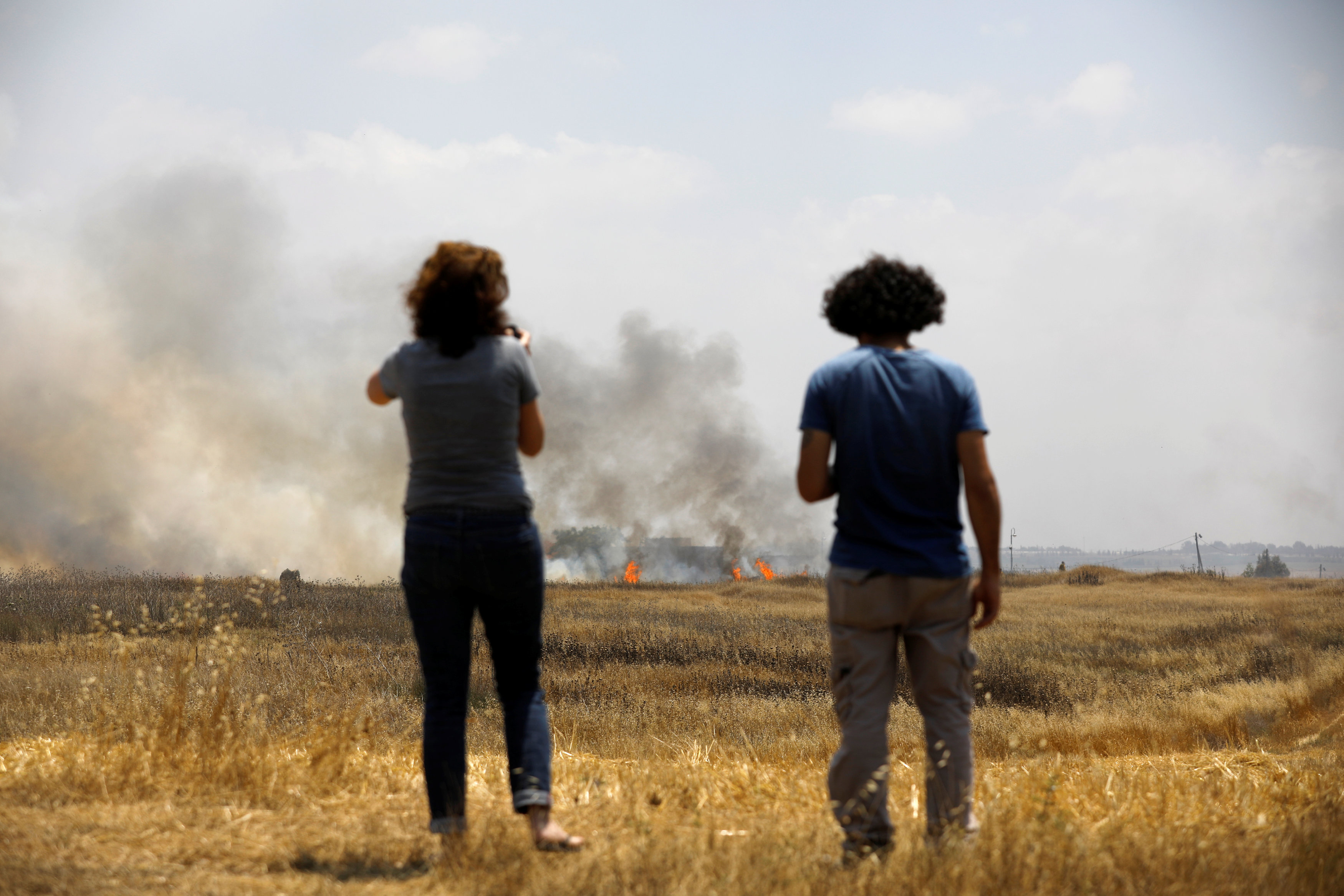 REUTERS/Mohammed Salem - Amir Cohen - Ibraheem Abu Mustafa