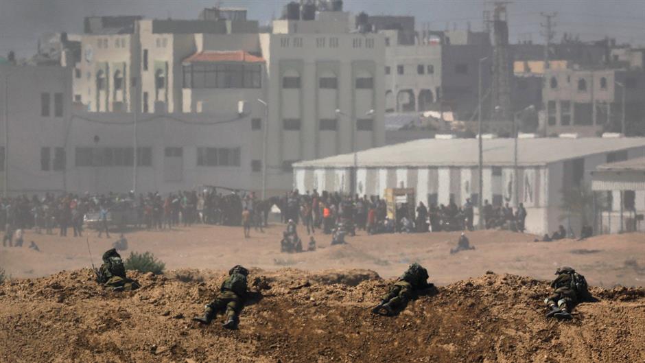 REUTERS/Mohammed Salem - Amir Cohen - Ibraheem Abu Mustafa