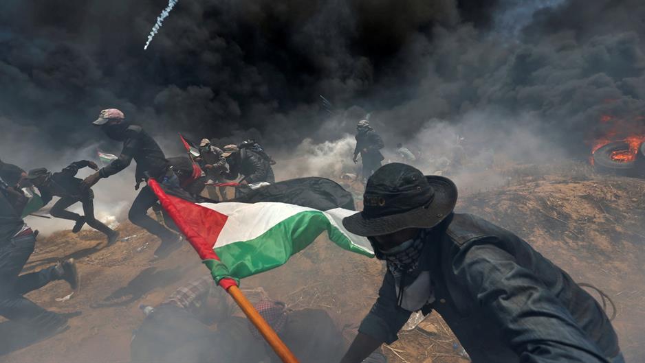 2018-05-14T201720Z_1547657010_RC1E34A4AF00_RTRMADP_3_ISRAEL-USA-PROTESTS-PALESTINIANS-PHOTOGRAPHS