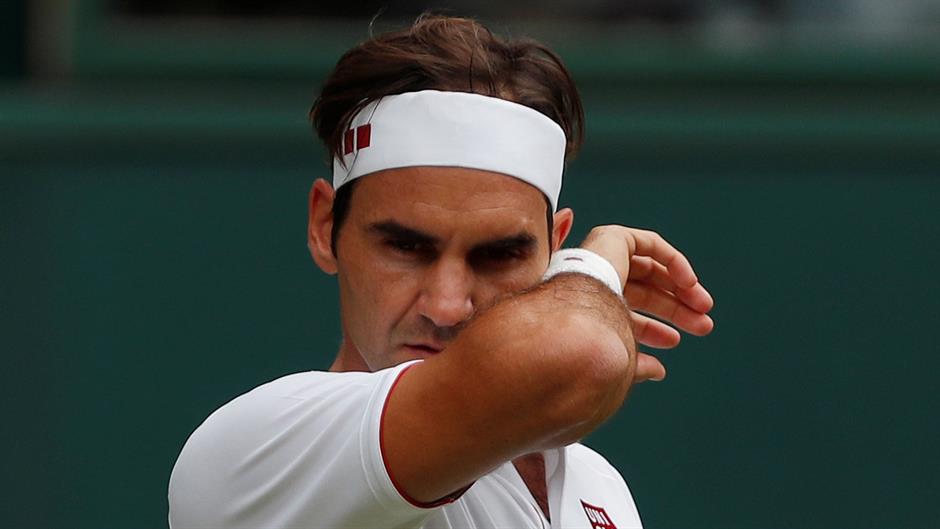 2018-07-04T142711Z_1860432115_RC1D53239390_RTRMADP_3_TENNIS-WIMBLEDON-FEDERER