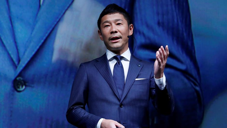 2018-09-18T021002Z_1840314152_RC1FF9FD2380_RTRMADP_3_SPACEX-MOON