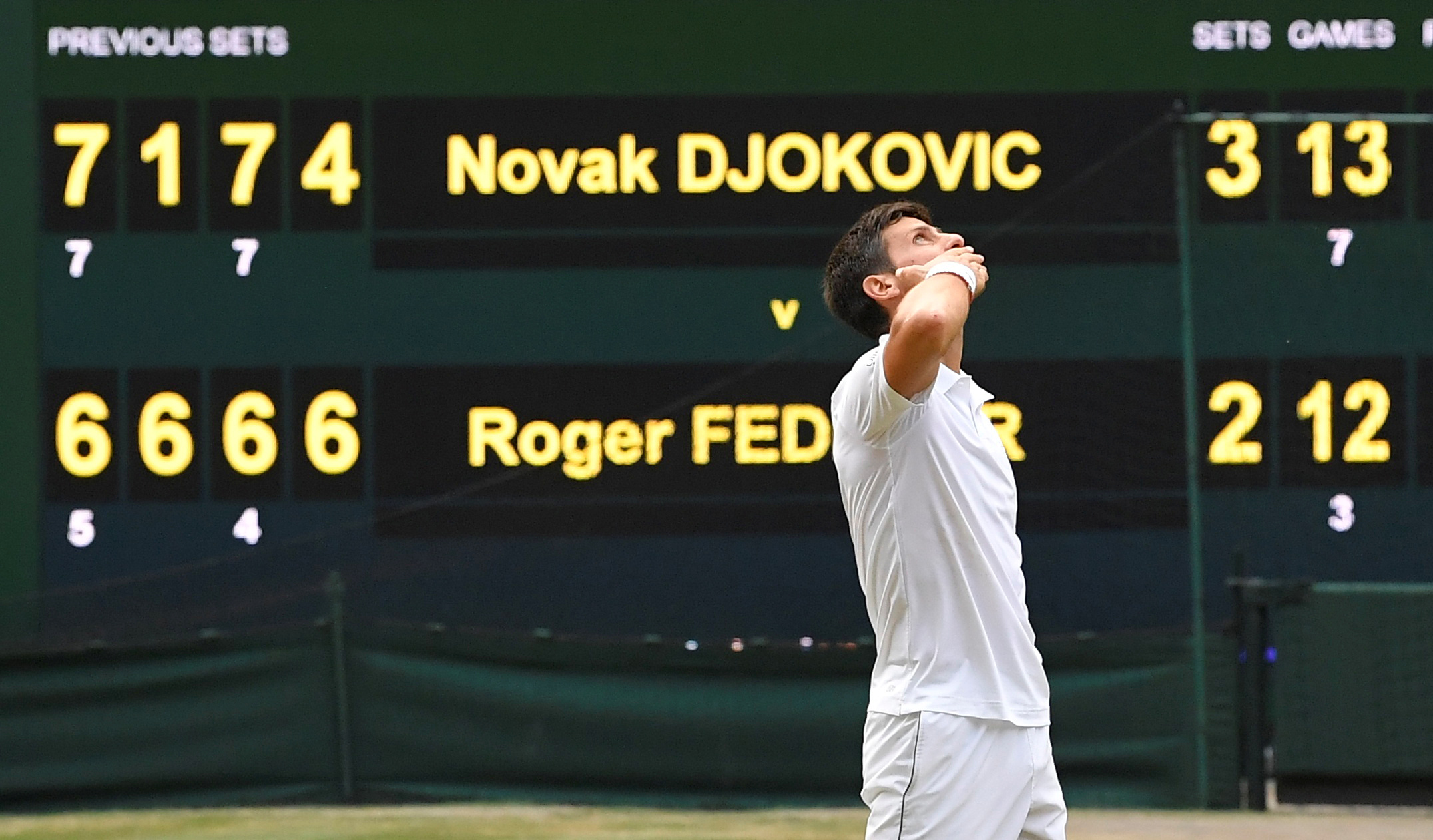 2019-07-14T190835Z_123417737_RC121CAE5100_RTRMADP_3_TENNIS-WIMBLEDON