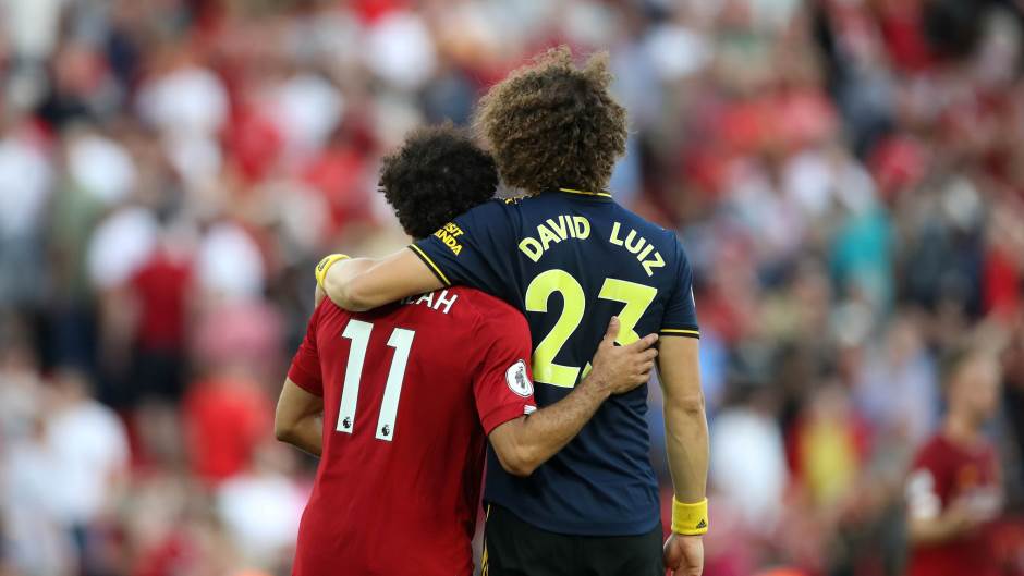 2019-08-24T182630Z_2106673989_RC121779FE70_RTRMADP_3_SOCCER-ENGLAND-LIV-ARS-REPORT