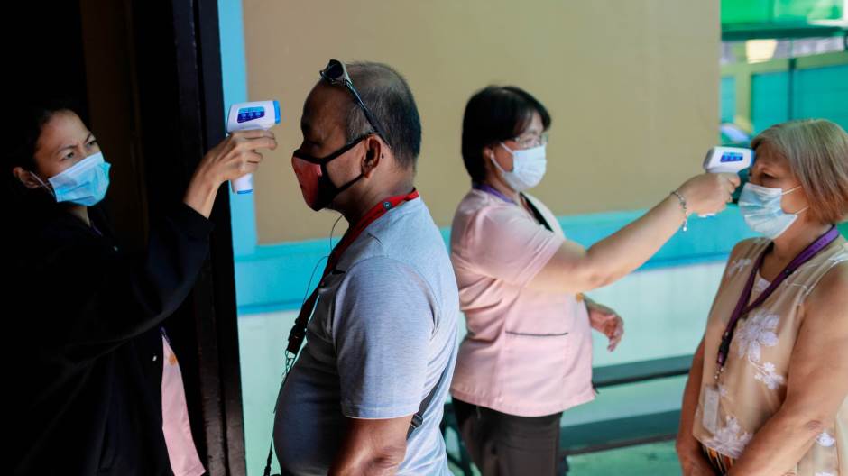 2020-01-28T100522Z_593302104_RC2YOE9AFE5M_RTRMADP_3_CHINA-HEALTH-PHILIPPINES-SCHOOL